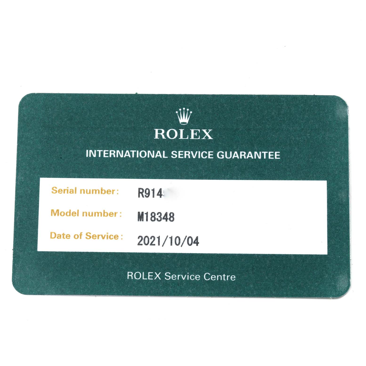 This image shows a Rolex International Service Guarantee card for the President model M18348.