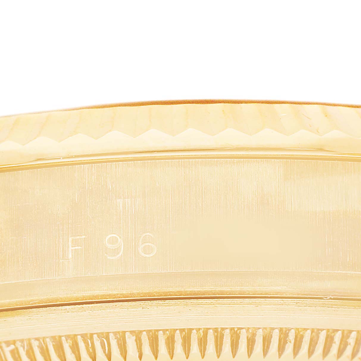 The image shows a close-up of the side of a Rolex President 118238 Men's Yellow Gold Champagne Dial model, highlighting the fluted bezel and part of the casing.