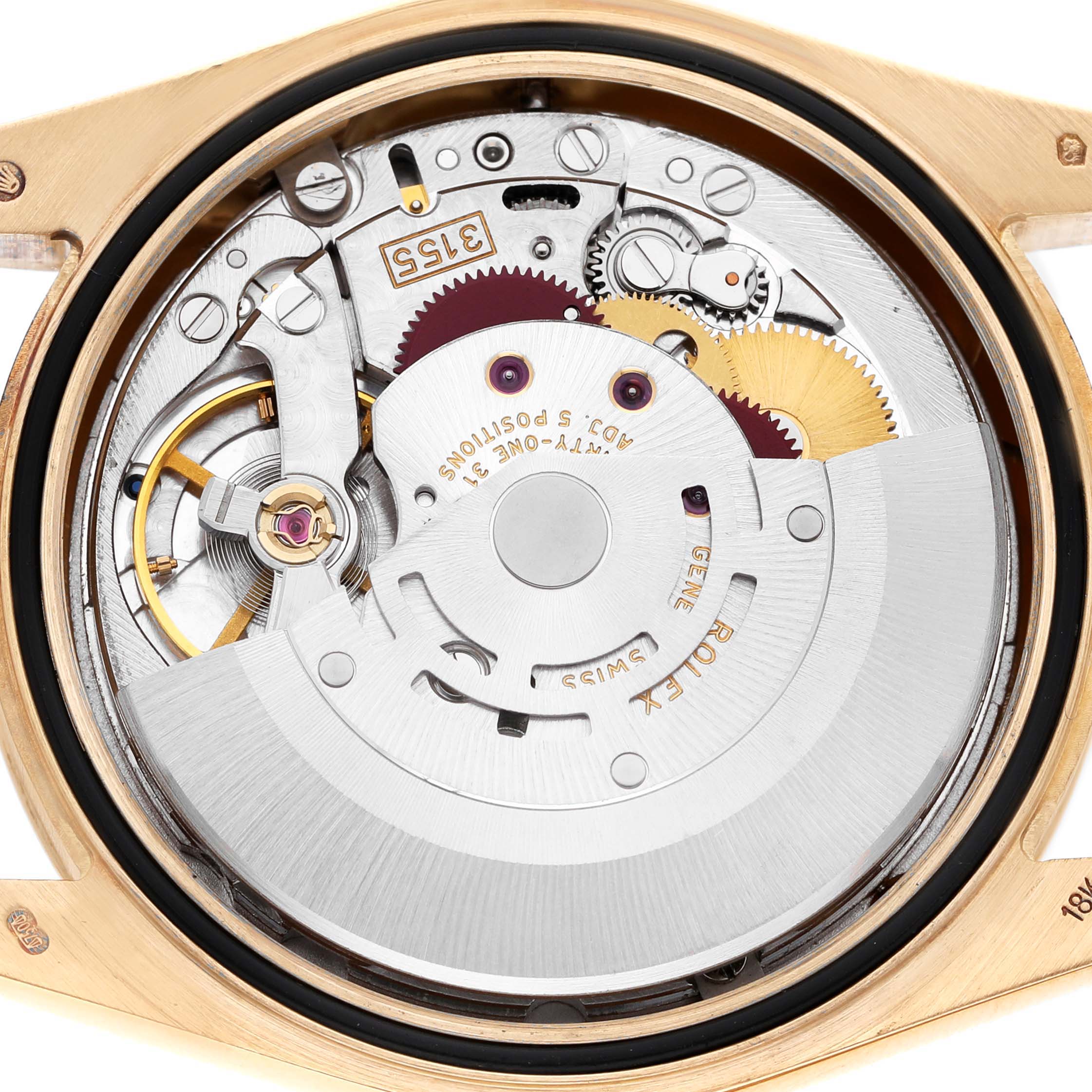 The image shows the movement of a Rolex President 118238 Men's Yellow Gold Champagne Dial watch from the back, highlighting gears and mechanical components.