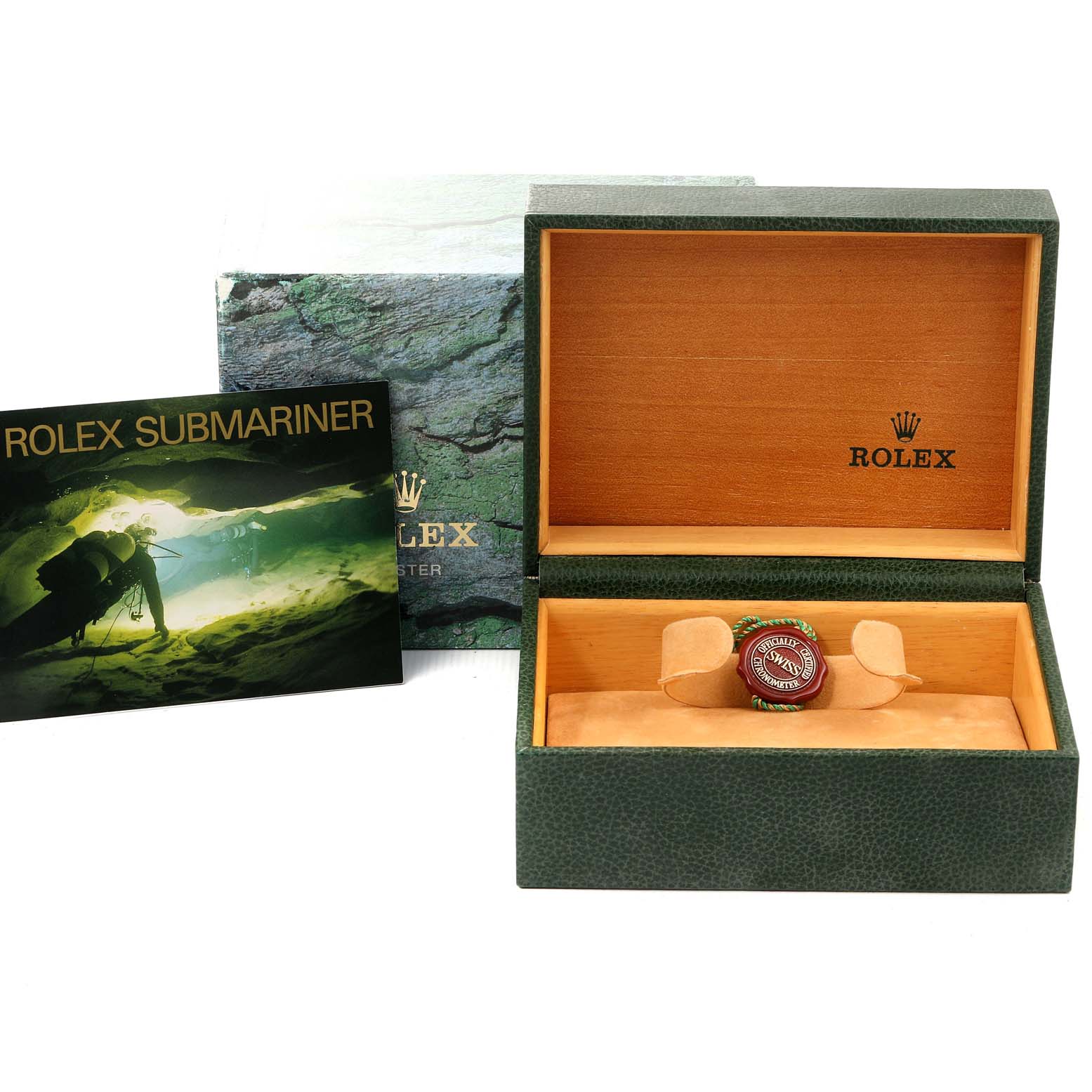 The image shows an open Rolex Submariner 14060 Men
s Stainless Steel Black Dial 14060 Men
s Stainless Steel Black Dial watch box with a booklet on the left.