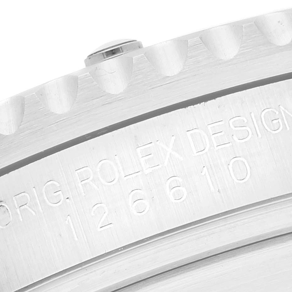 This close-up image shows the engraved model number and design inscription on the bezel of a Rolex Submariner 126610 Men
s Stainless Steel Black Dial 126610 Men
s Stainless Steel Black Dial watch.