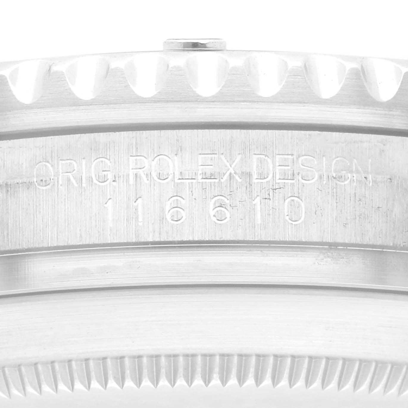 The image shows the side profile of the Rolex Submariner 116610 Men
s Stainless Steel Black Dial, focusing on the case and engraved design number.