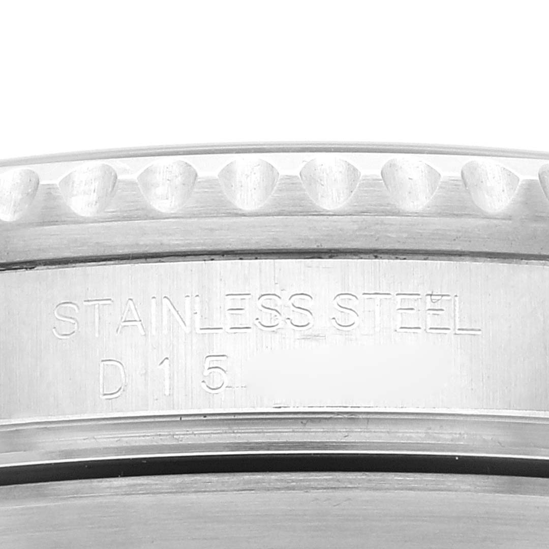 This close-up image shows the stainless steel casing of a Rolex Submariner 16610LV Men
s Stainless Steel Black Dial 16610LV Men
s Stainless Steel Black Dial watch, focusing on the engraved text.