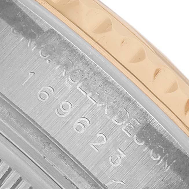 The image shows a close-up of the side of a Rolex Yacht-Master 169623 Women's Steel and Gold (two tone) Champagne Dial watch, highlighting the engraved model number and two-tone bezel.