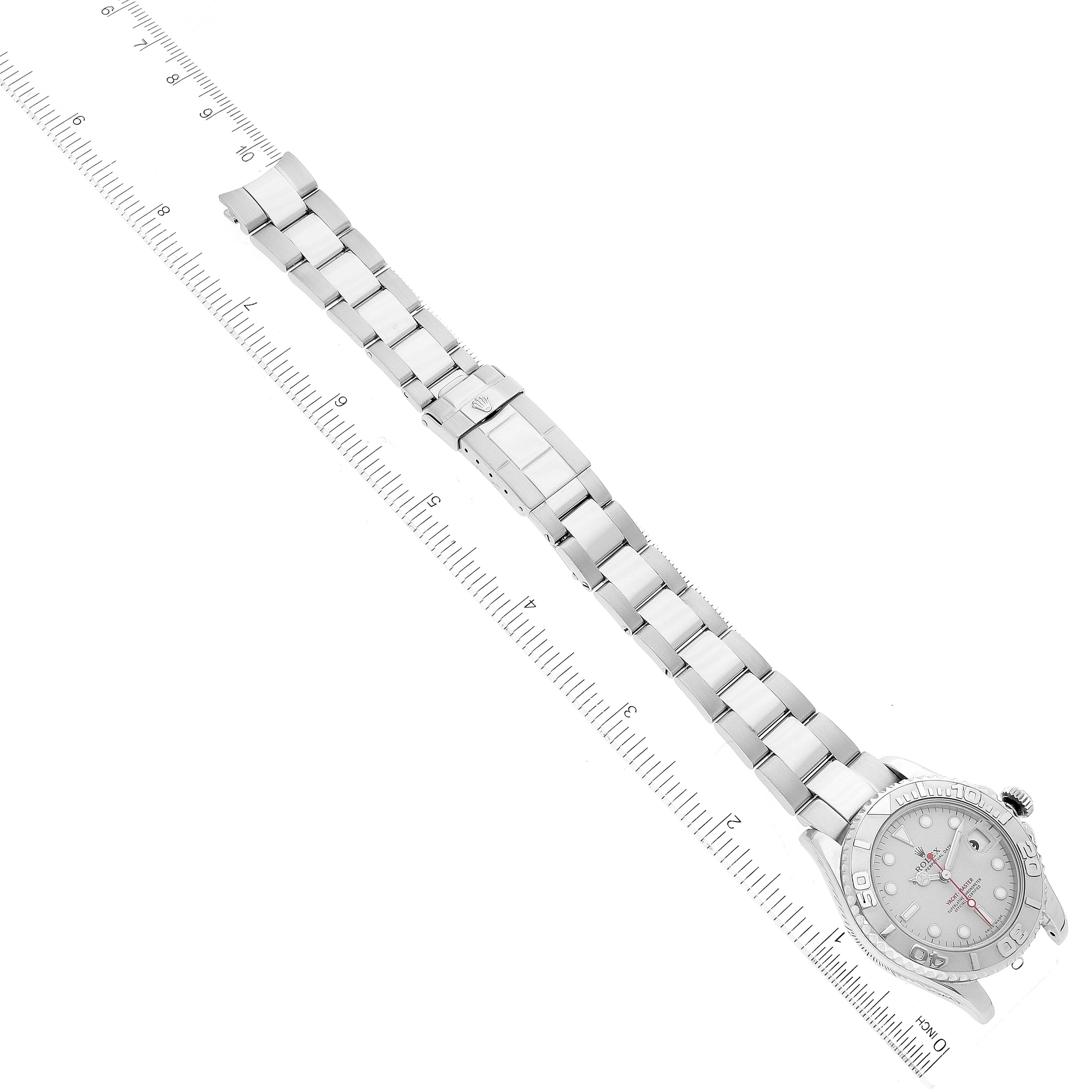The image shows a full Rolex Yacht-Master 168622 Men's Stainless Steel Silver Dial 168622 Men's Stainless Steel Silver Dial watch laying flat, with the band extended and measured against a ruler.