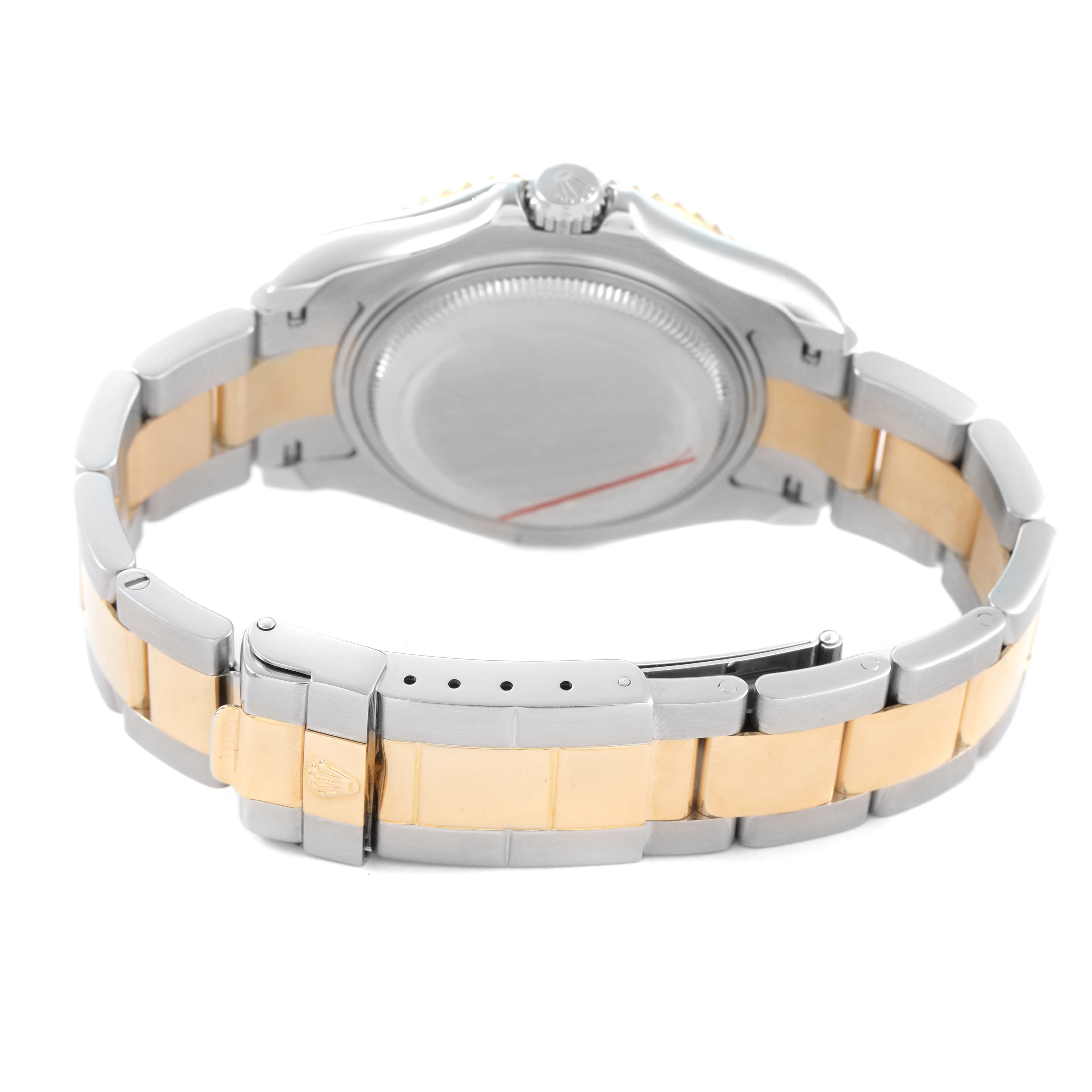 The Rolex Yacht-Master 168623 Men's Steel and Gold (two tone) Champagne Dial is shown from the back, highlighting the case back, crown, and two-tone bracelet with clasp.