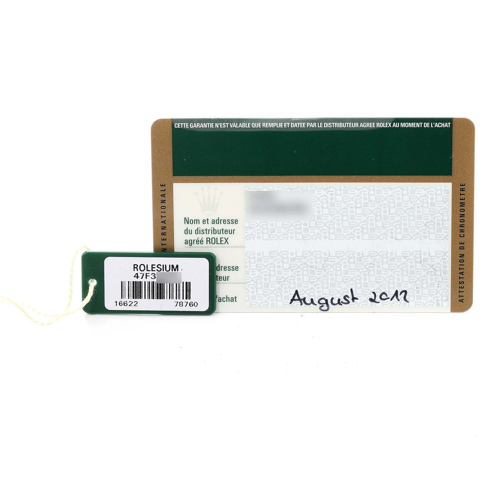 The image shows a Rolex Yacht-Master 16622 Men's Stainless Steel Silver Dial 16622 Men's Stainless Steel Silver Dial warranty card and a Rolex tag with the text "ROLESIUM 47F3" and a barcode.