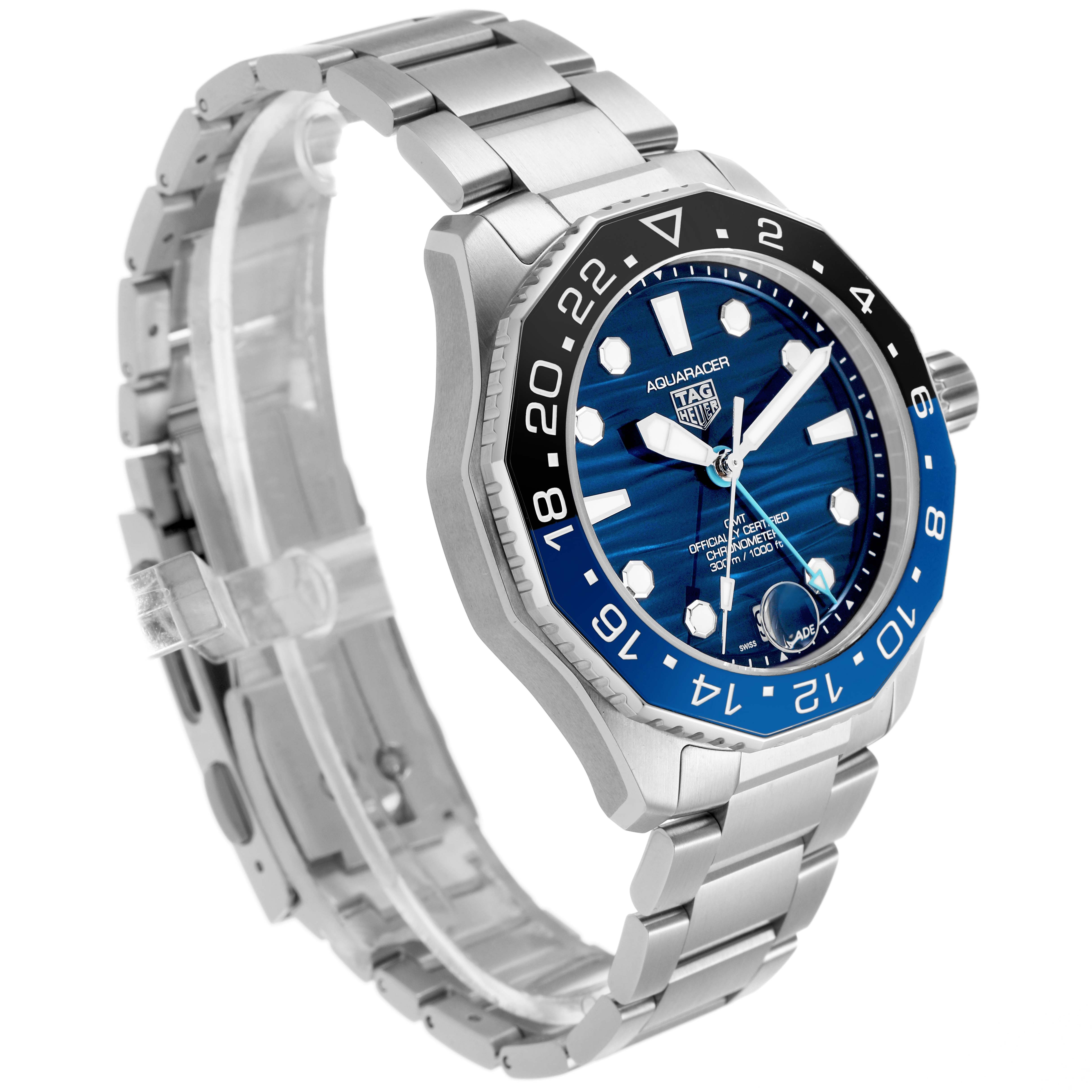 The Tag Heuer Aquaracer WBP5114 Men's Stainless Steel Blue Dial is shown at an angled side view highlighting the face, bezel, crown, and bracelet.