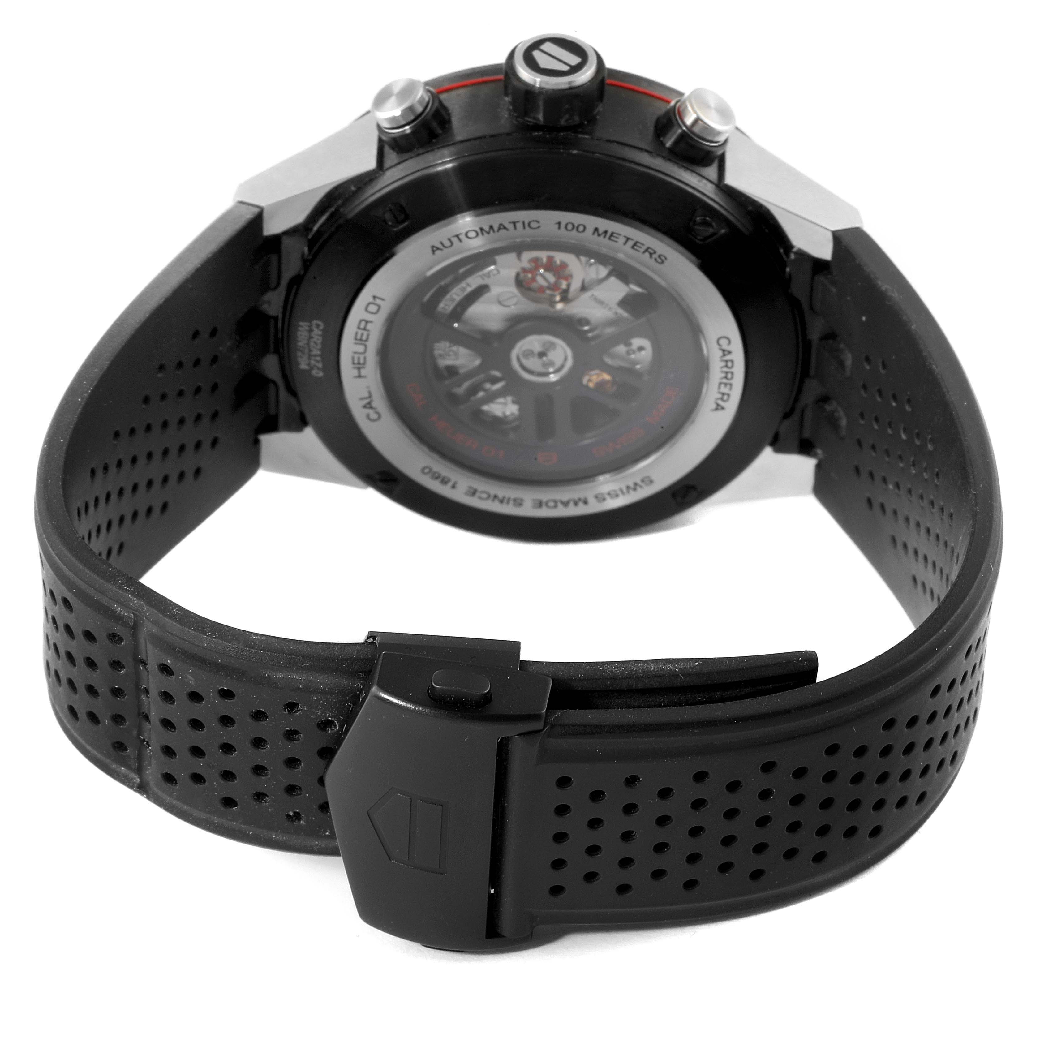 The image shows the back view of a Tag Heuer Carrera CAR2A1Z.FT6044 Men
s Stainless Steel Black Dial CAR2A1Z.FT6044 Men
s Stainless Steel Black Dial watch, highlighting the rubber strap, clasp, and transparent case back.