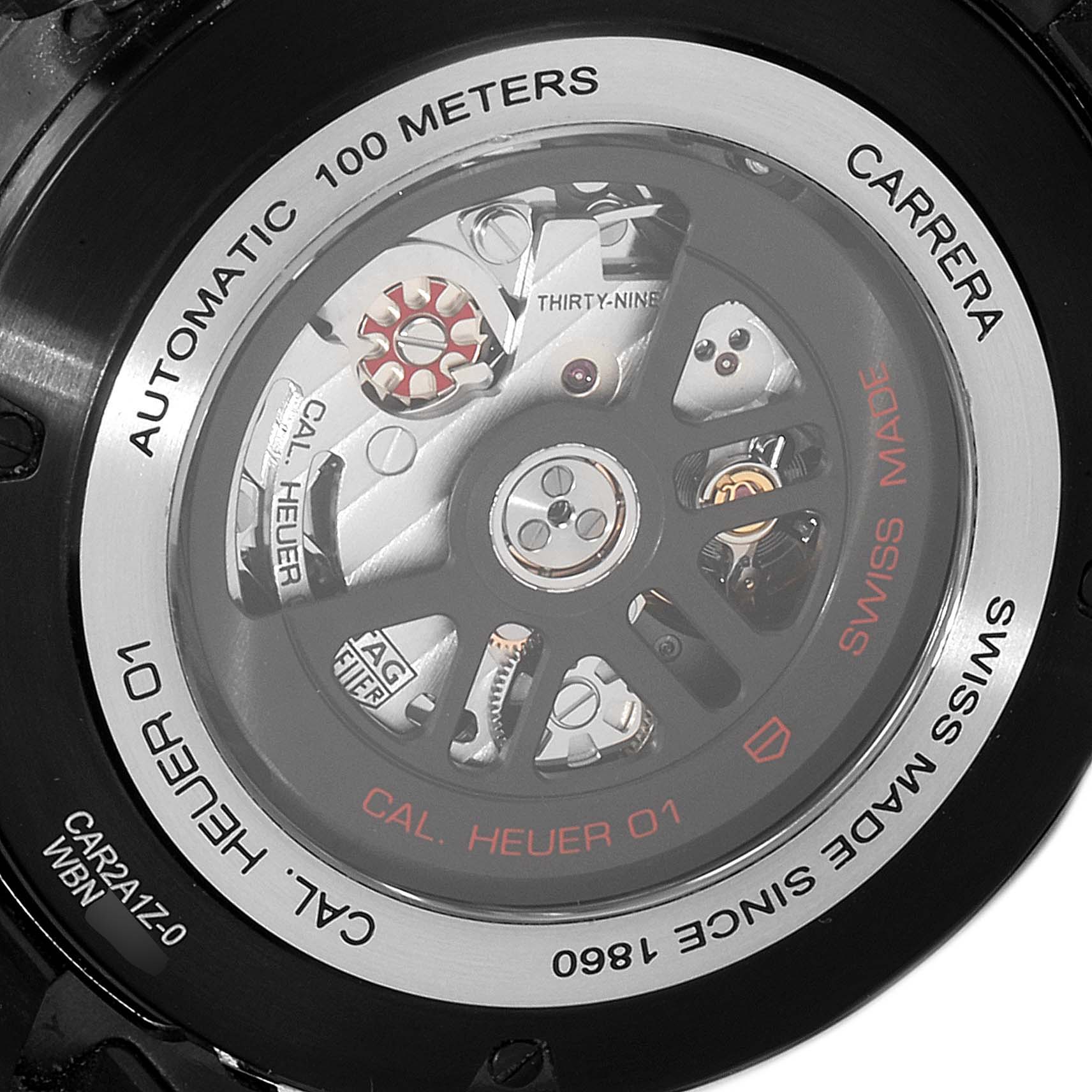 The image shows the back view of a Tag Heuer Carrera CAR2A1Z.FT6044 Men
s Stainless Steel Black Dial CAR2A1Z.FT6044 Men
s Stainless Steel Black Dial watch, displaying its automatic movement labeled Cal. Heuer 01.
