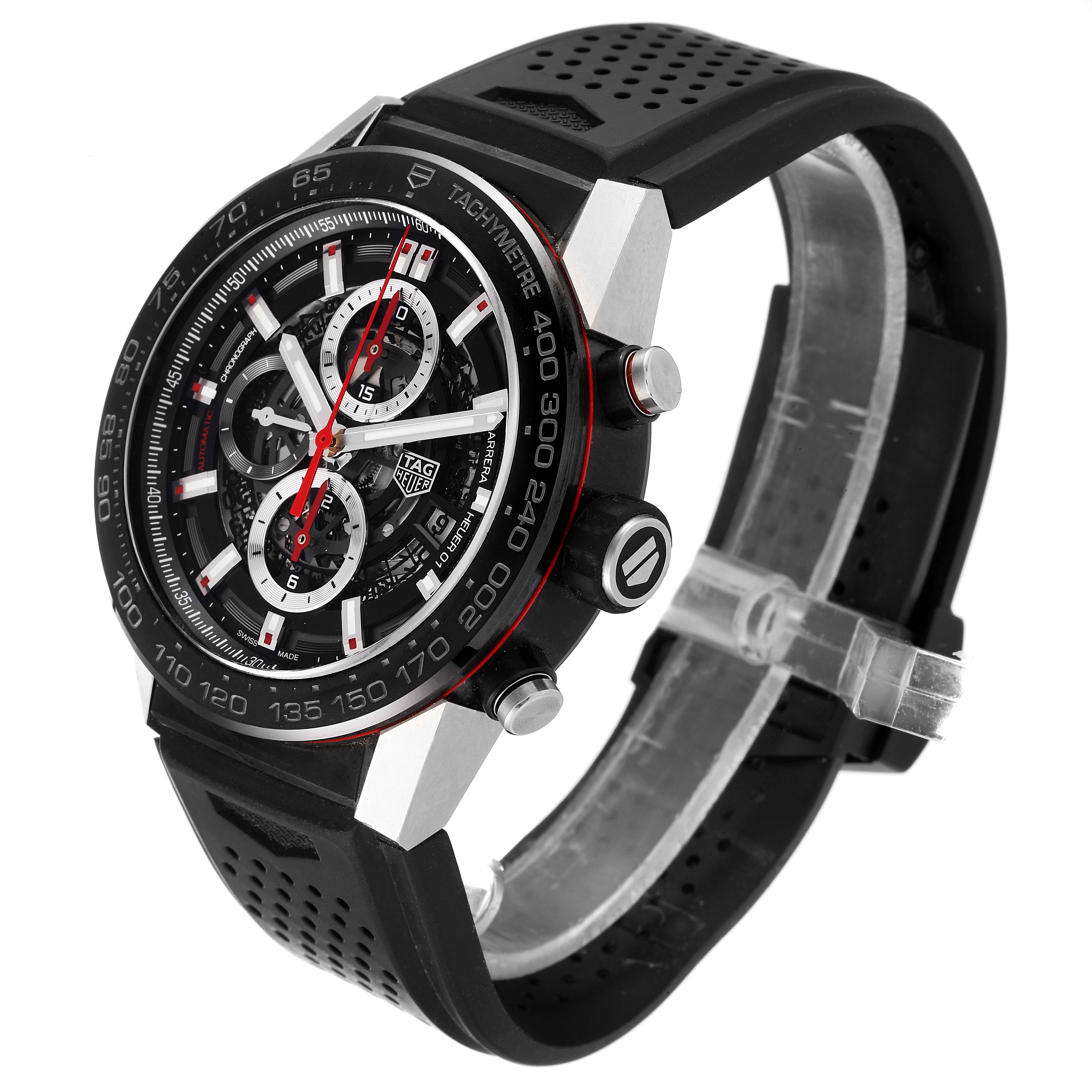 The image shows a Tag Heuer Carrera CAR2A1Z.FT6044 Men
s Stainless Steel Black Dial CAR2A1Z.FT6044 Men
s Stainless Steel Black Dial model watch angled slightly to the right, highlighting its black dial, tachymeter, and perforated rubber strap.