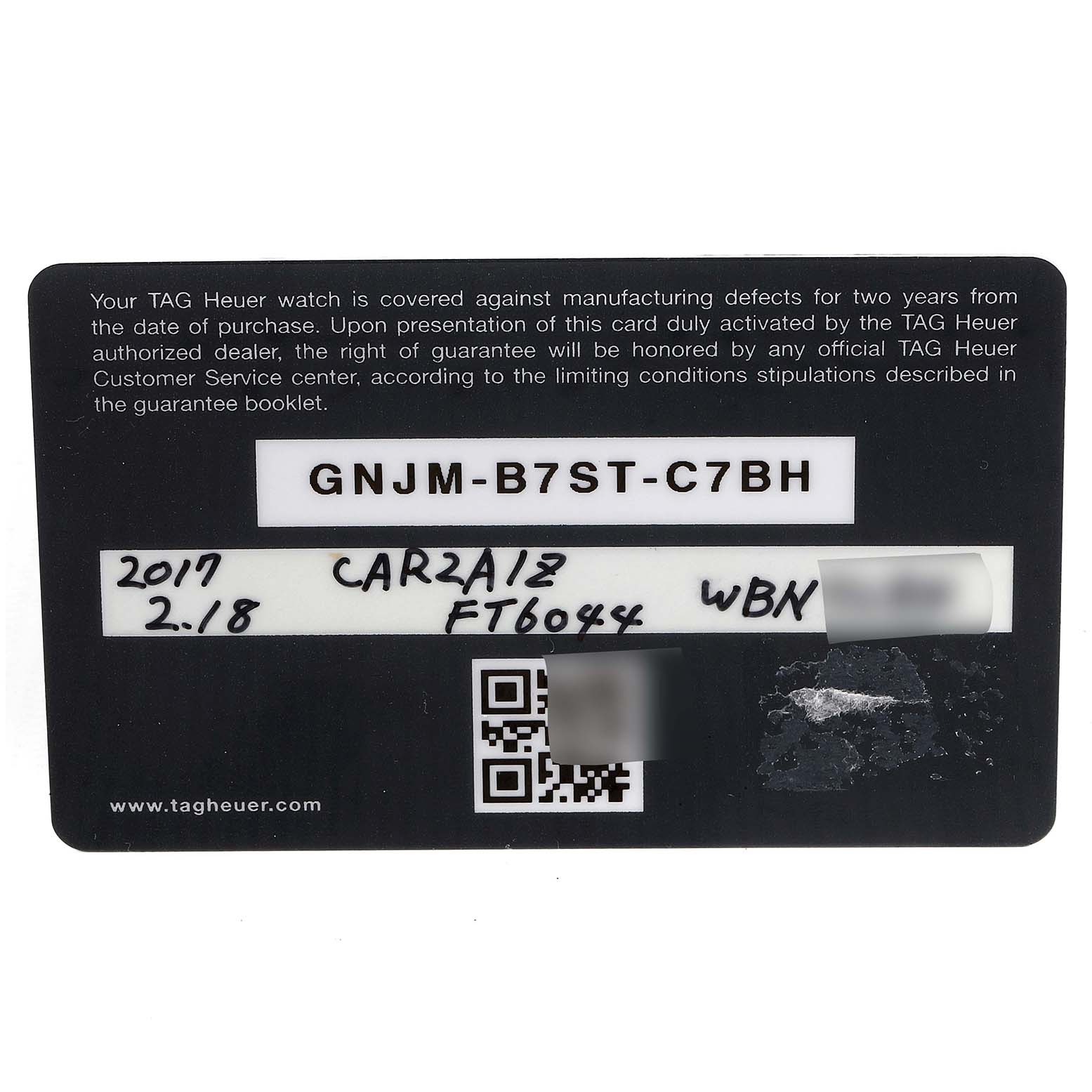 The image shows the warranty card for the Tag Heuer Carrera CAR2A1Z.FT6044 Men
s Stainless Steel Black Dial CAR2A1Z.FT6044 Men
s Stainless Steel Black Dial model.