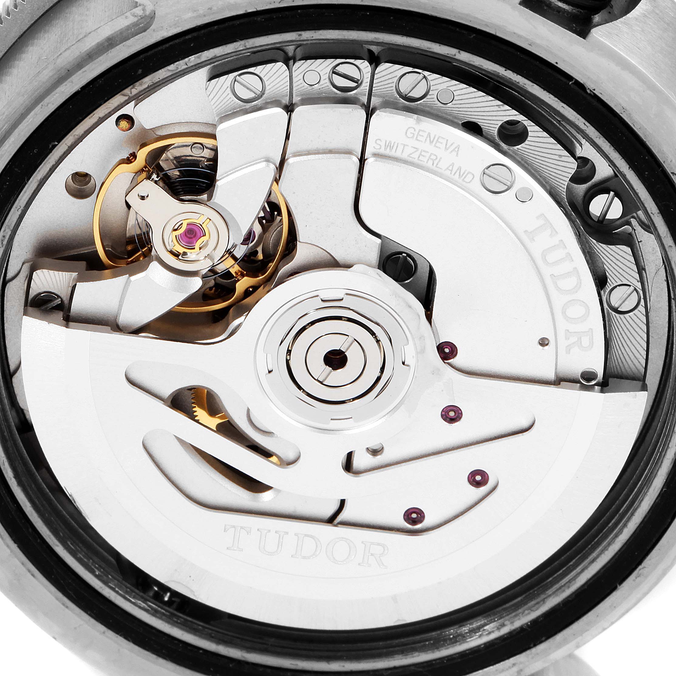 This image shows a close-up of the movement inside a Tudor Pelagos 25600TV Men
s Titanium Blue Dial 25600TV Men
s Titanium Blue Dial watch, featuring gears and the rotor.