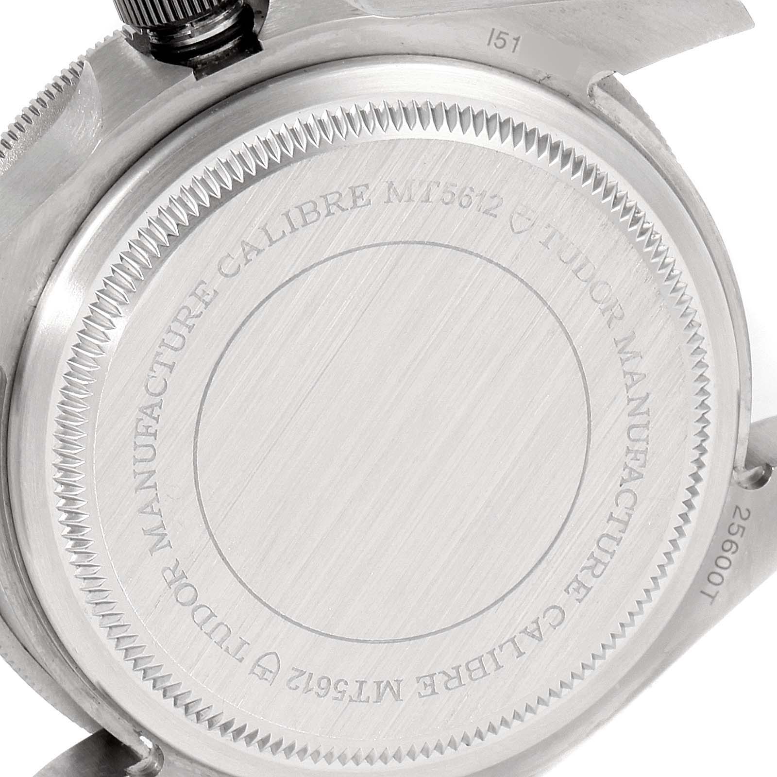 The image shows the backside of a Tudor Pelagos 25600TV Men
s Titanium Blue Dial 25600TV Men
s Titanium Blue Dial watch, highlighting the case back engraving and rotor details.