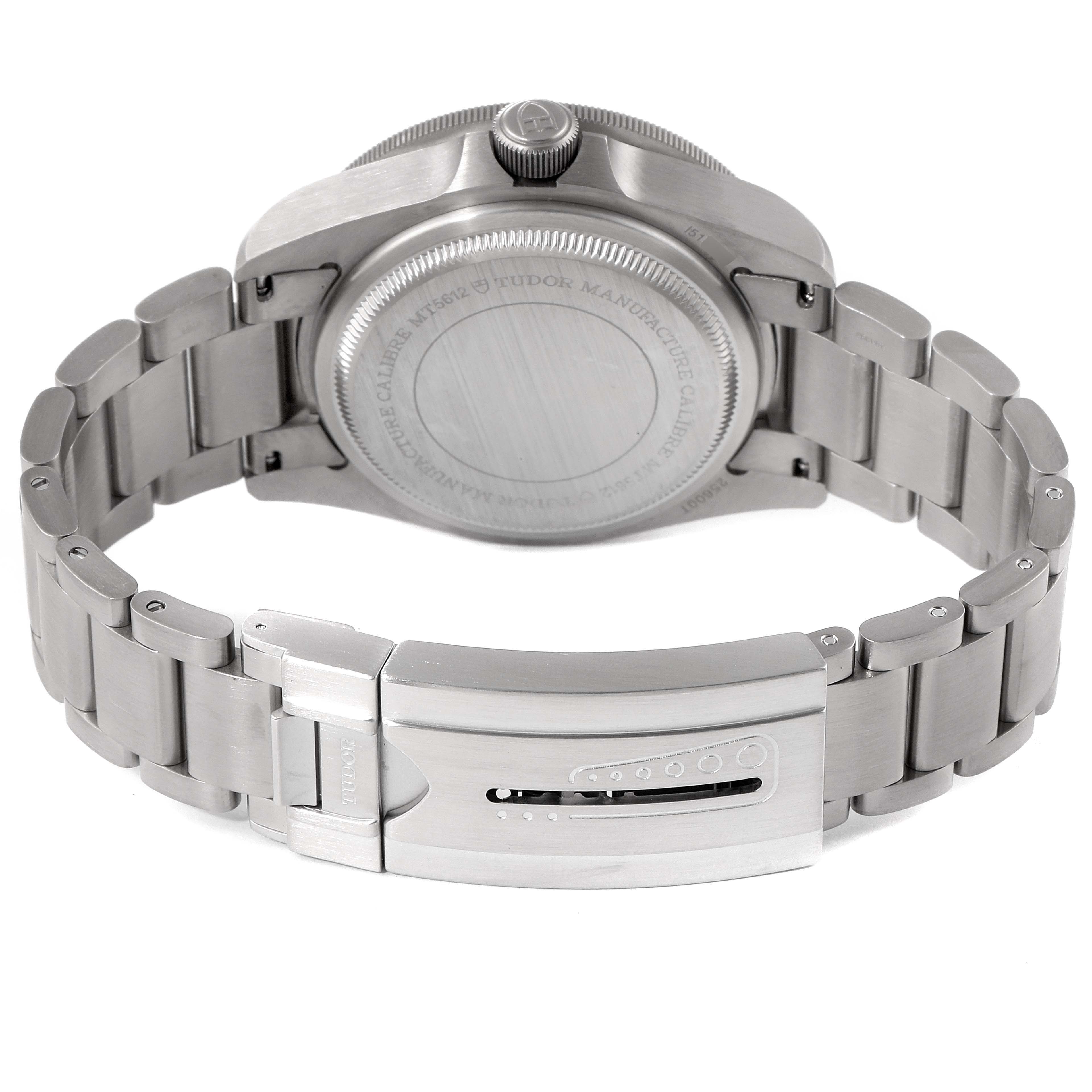 The image shows the back case and clasp of a Tudor Pelagos 25600TV Men
s Titanium Blue Dial 25600TV Men
s Titanium Blue Dial watch viewed from the rear.