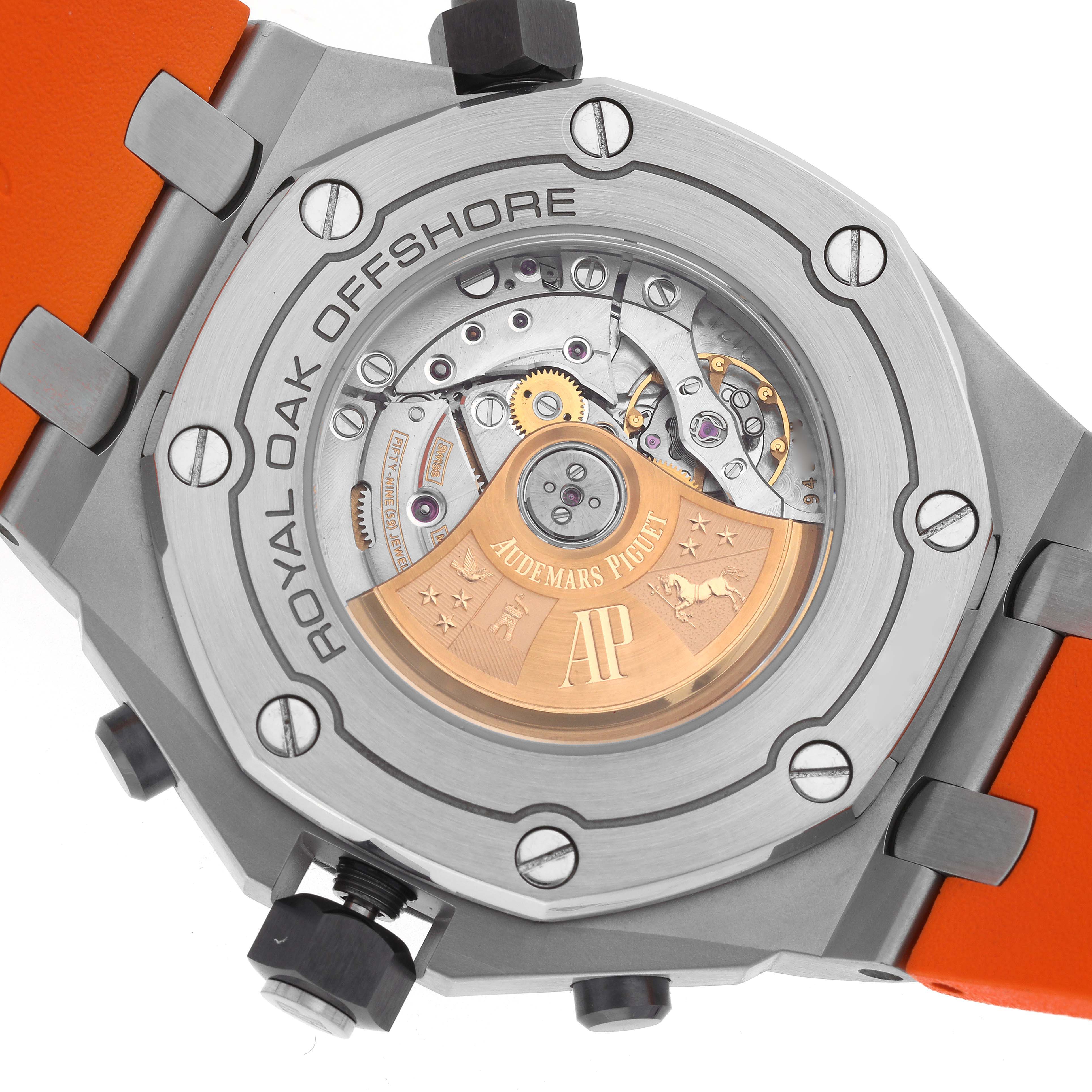 The image shows the back view of a Royal Oak Offshore by Audemars Piguet, highlighting the movement and rotor details.