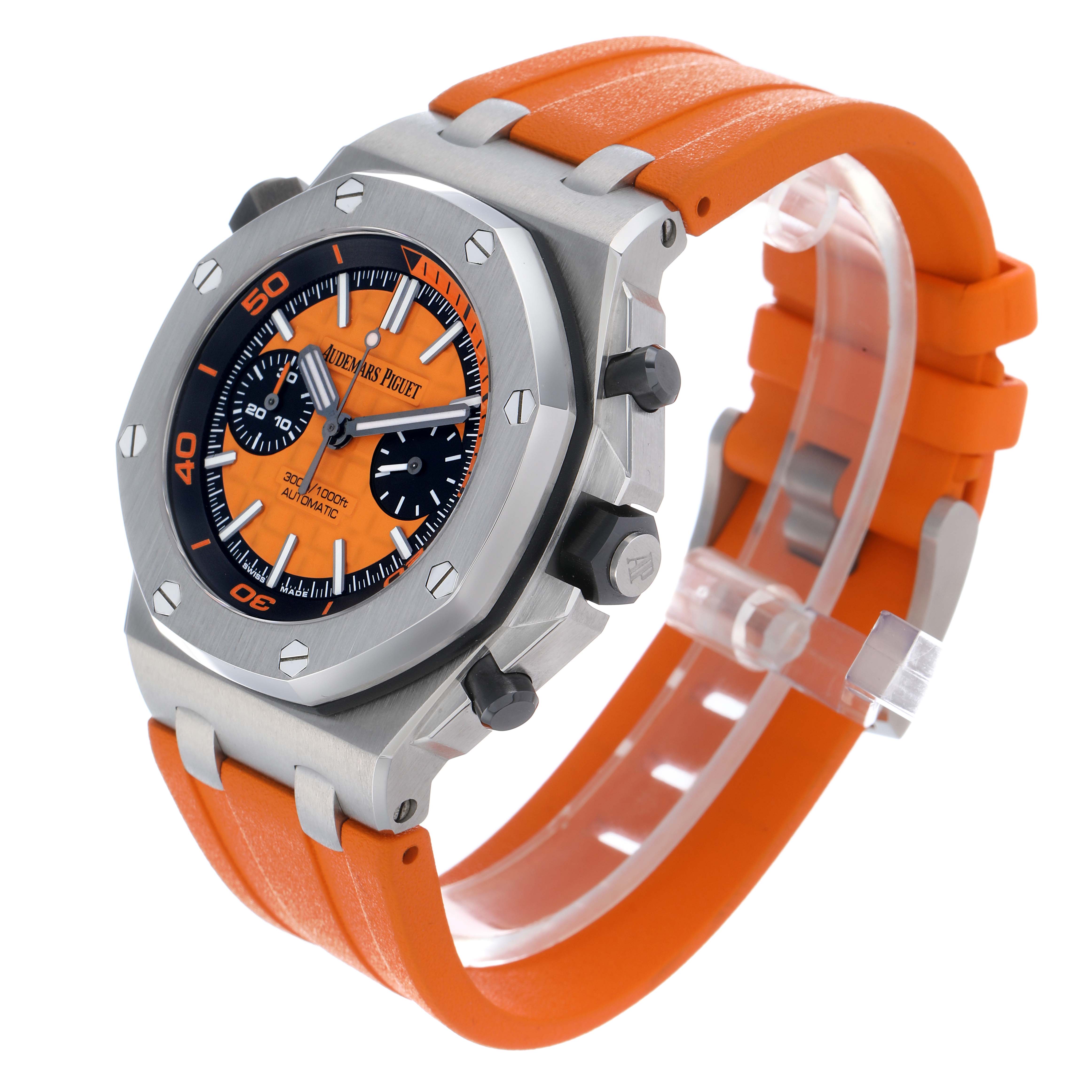 The Audemars Piguet Royal Oak Offshore 26703ST Men
s Stainless Steel Orange Dial watch is shown at an oblique angle, highlighting the orange dial, bezel, and rubber strap.