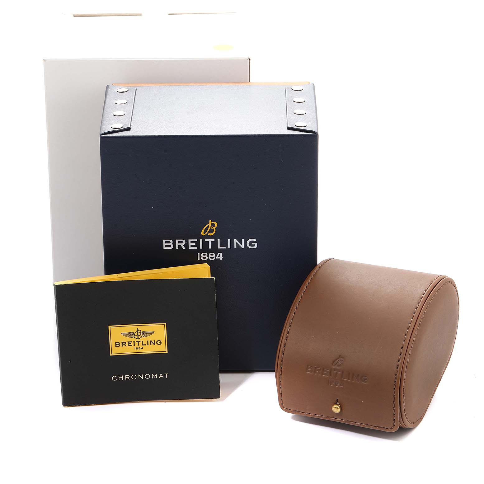 The image shows packaging accessories for the Breitling Chronomat CB011012 Men's Steel and Gold (two tone) Black Dial CB011012 Men's Steel and Gold (two tone) Black Dial watch, including a box, a leather case, and a booklet.