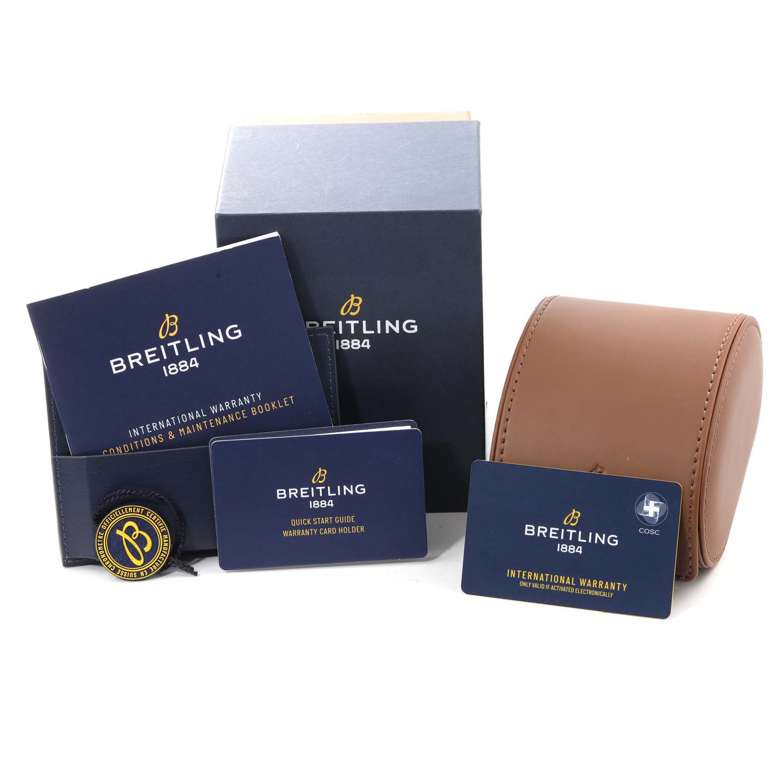 The image shows the Breitling Superocean A17366 Men's Stainless Steel Orange Dial A17366 Men's Stainless Steel Orange Dial packaging, manuals, warranty cards, and a brown watch case.