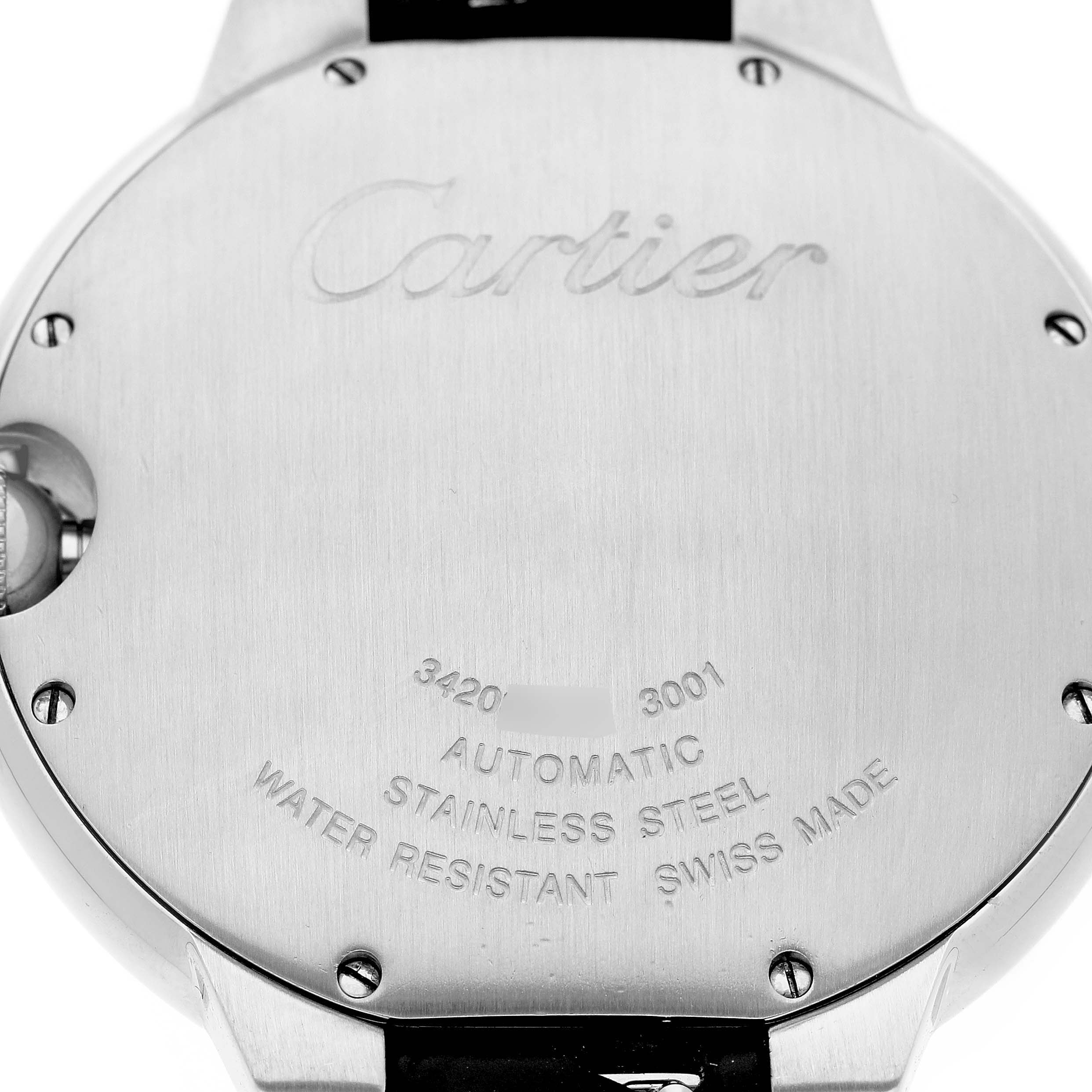 The image shows the back casing of a Cartier Ballon Bleu W69016Z4 Men's Stainless Steel Silver Dial watch, highlighting engravings and a portion of the strap.