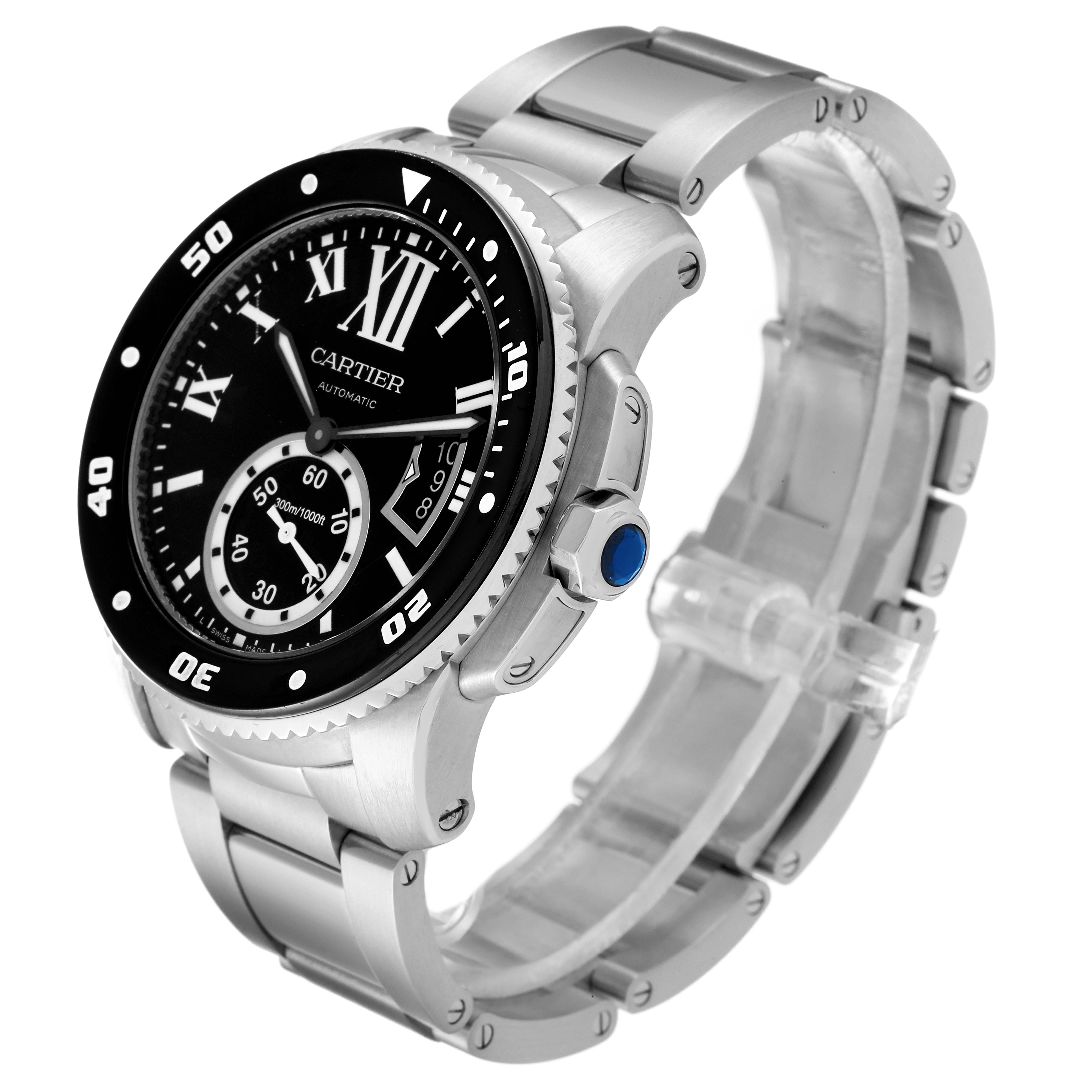 This image shows the Calibre de Cartier watch by Cartier at a three-quarter angle, highlighting the black bezel, dial, and metal bracelet.
