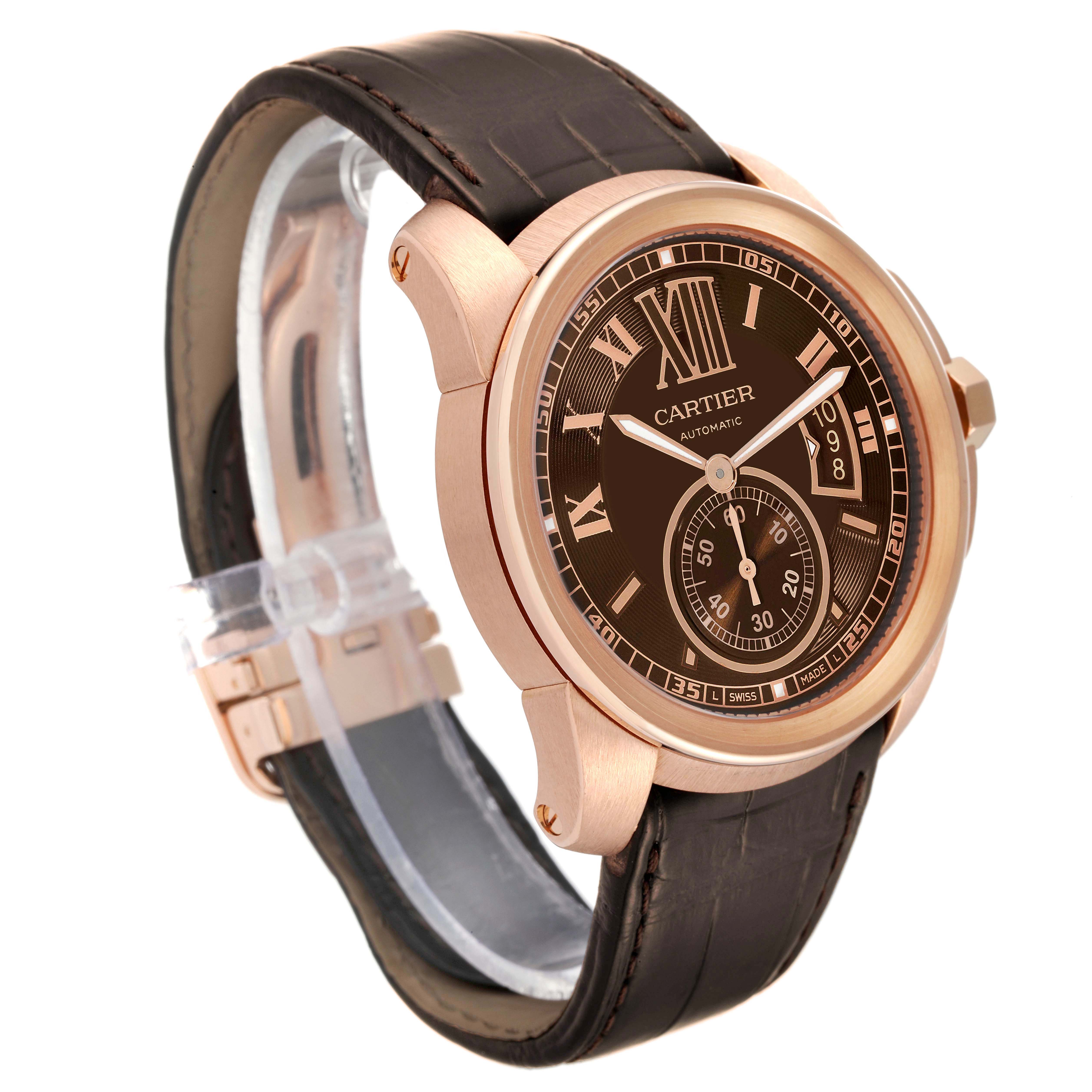 The image shows a side angle of the Calibre de Cartier model by Cartier, highlighting its case, dial, and leather strap.