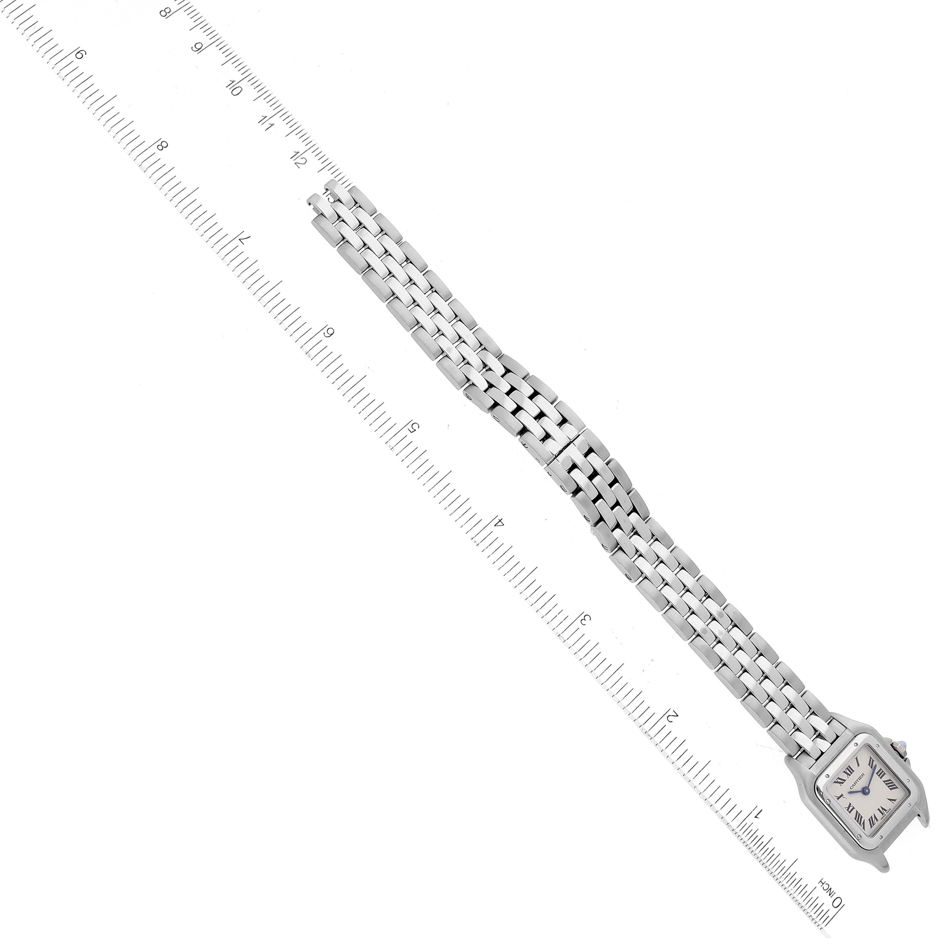 The image shows a Panthere model by Cartier, displayed horizontally with a ruler beside it to measure length.