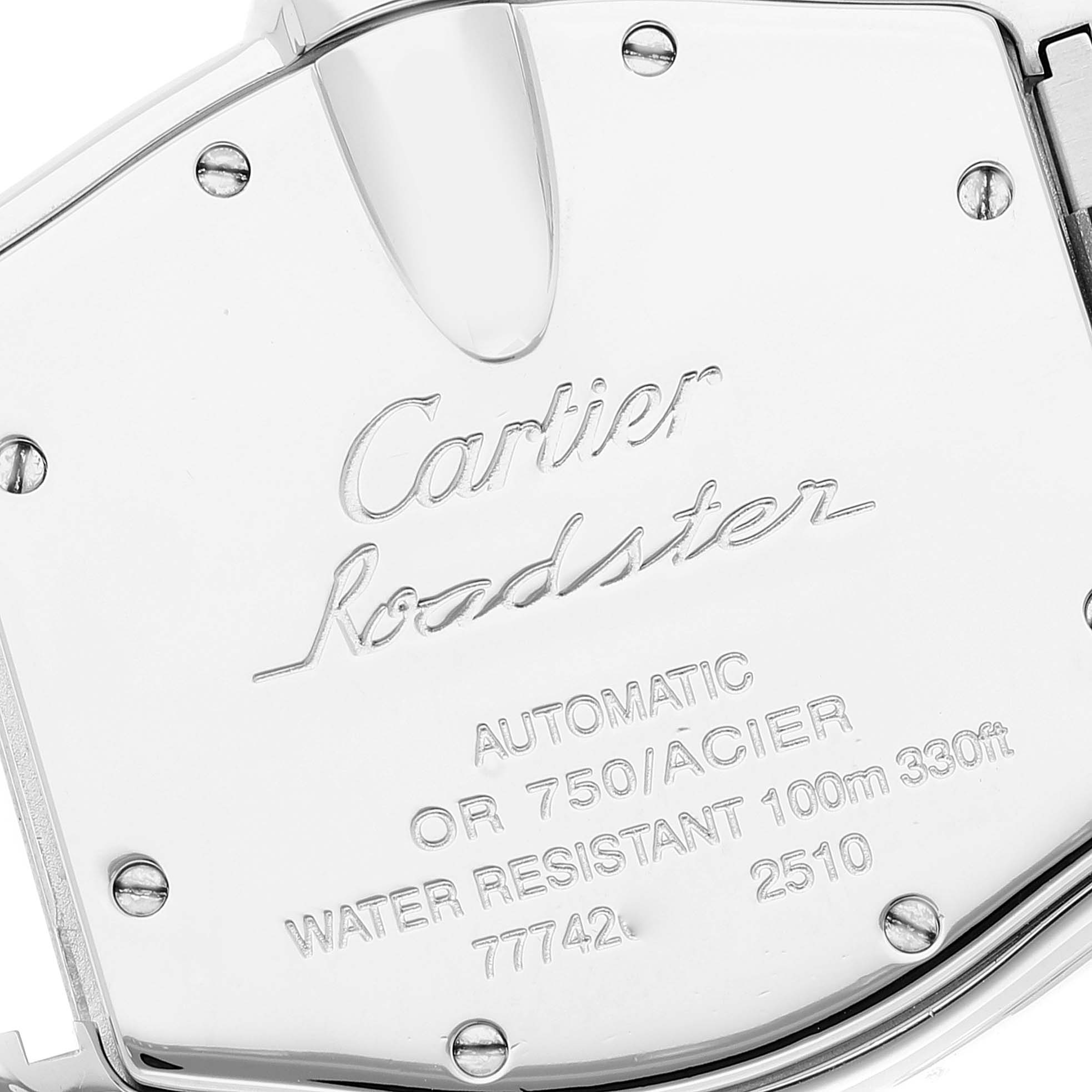 This image shows the back case of a Cartier Roadster W62031Y4 Men
s Steel and Gold (two tone) Silver Dial W62031Y4 Men
s Steel and Gold (two tone) Silver Dial watch, featuring engraved details and screws.