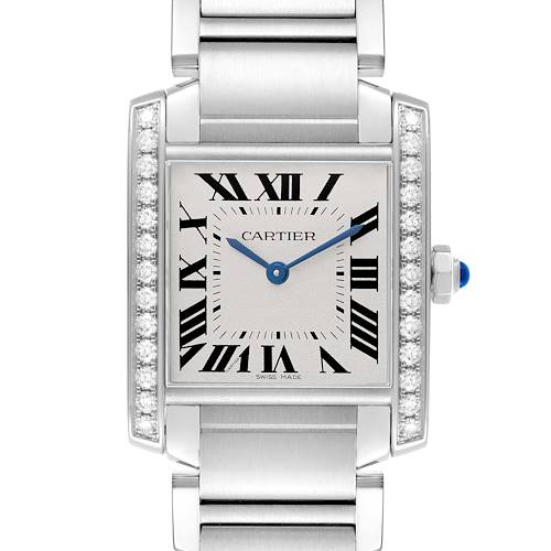 The Cartier Tank Francaise W4TA0009 Women's Stainless Steel Silver Dial watch is shown from a front angle, highlighting the dial, Roman numerals, and diamond-studded bezel.