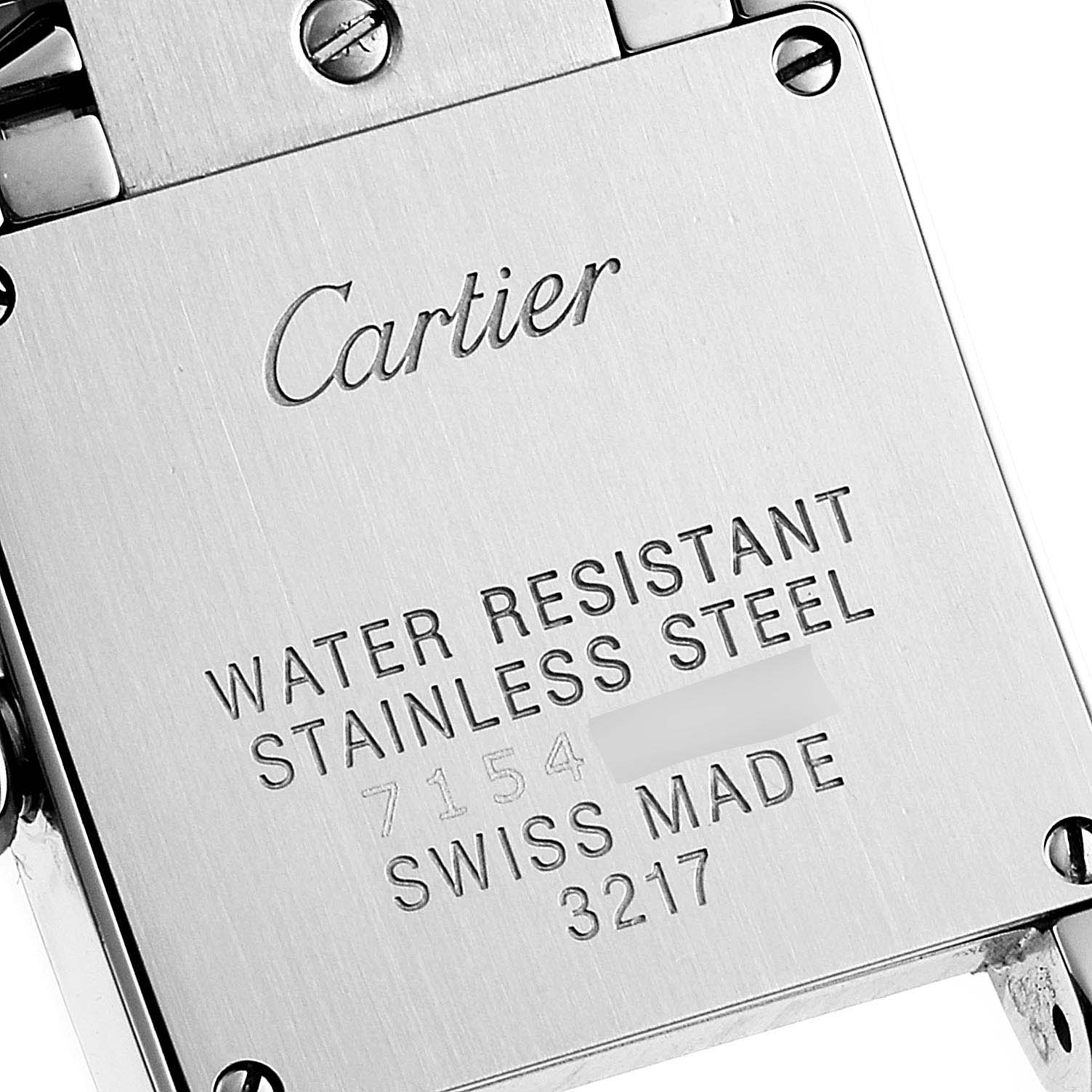 This image shows the back case of a Cartier Tank Francaise W4TA0008 Women
s Stainless Steel Silver Dial W4TA0008 Women
s Stainless Steel Silver Dial watch, highlighting the "Water Resistant" and "Stainless Steel" engravings.