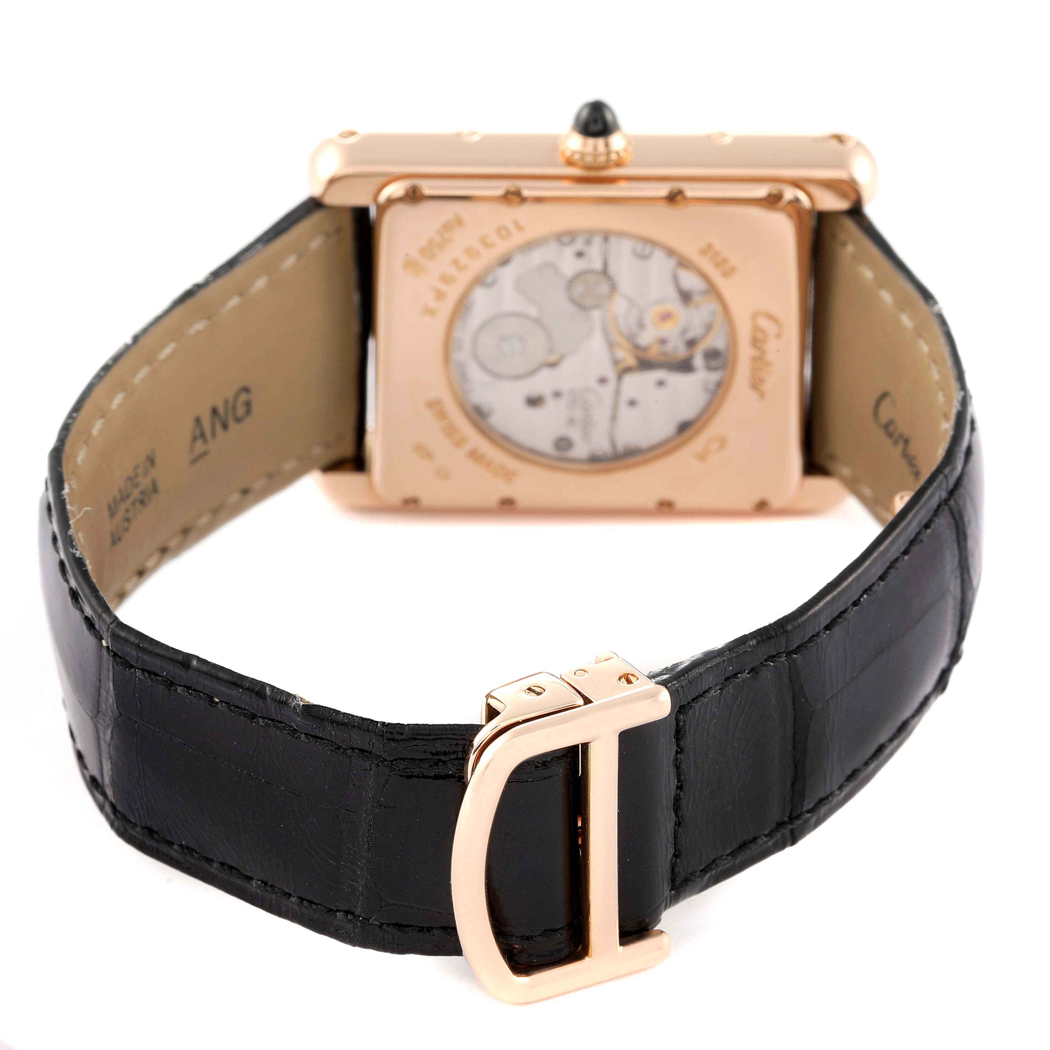 The image shows the back view of a Cartier Tank Louis W1560003 Men's Rose Gold Silver Dial W1560003 Men's Rose Gold Silver Dial model watch, highlighting its movement and black leather strap.