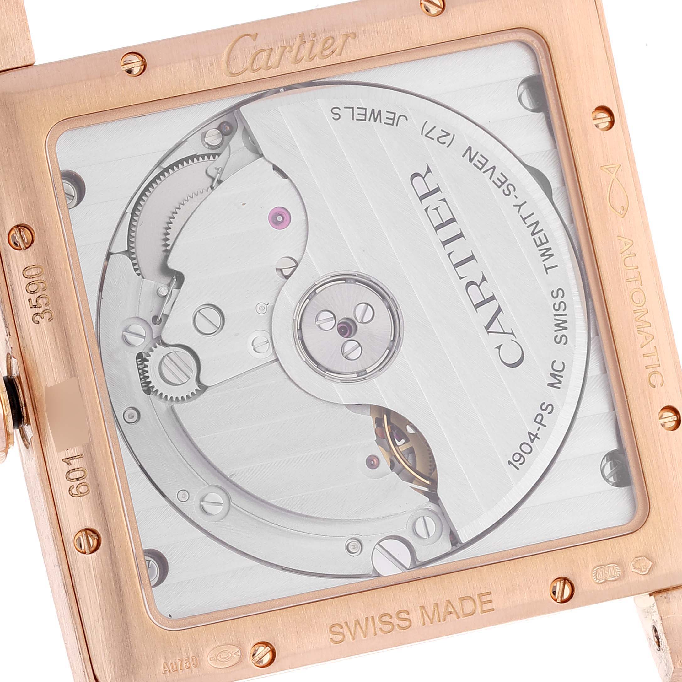 This image shows a close-up of the back of the Cartier Tank MC W5330002 Men
s Rose Gold Brown Dial W5330002 Men
s Rose Gold Brown Dial watch, highlighting its intricate automatic movement.