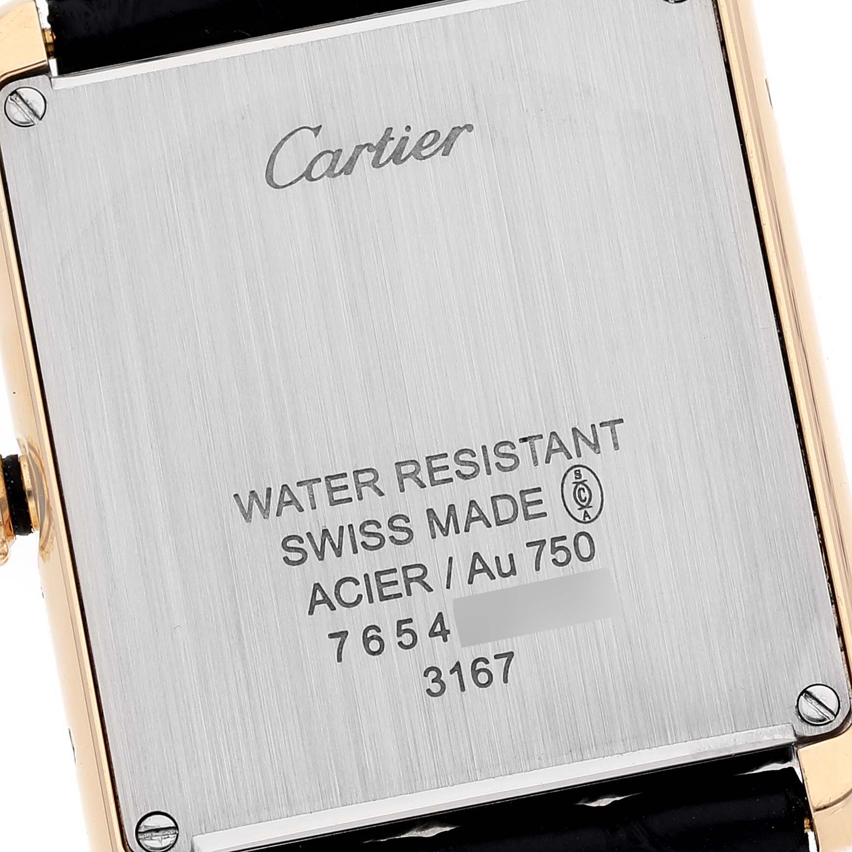 The image shows the backplate of a Cartier Tank Solo W5200004 Men
s Yellow Gold Silver Dial W5200004 Men
s Yellow Gold Silver Dial watch with details about its water resistance and materials.