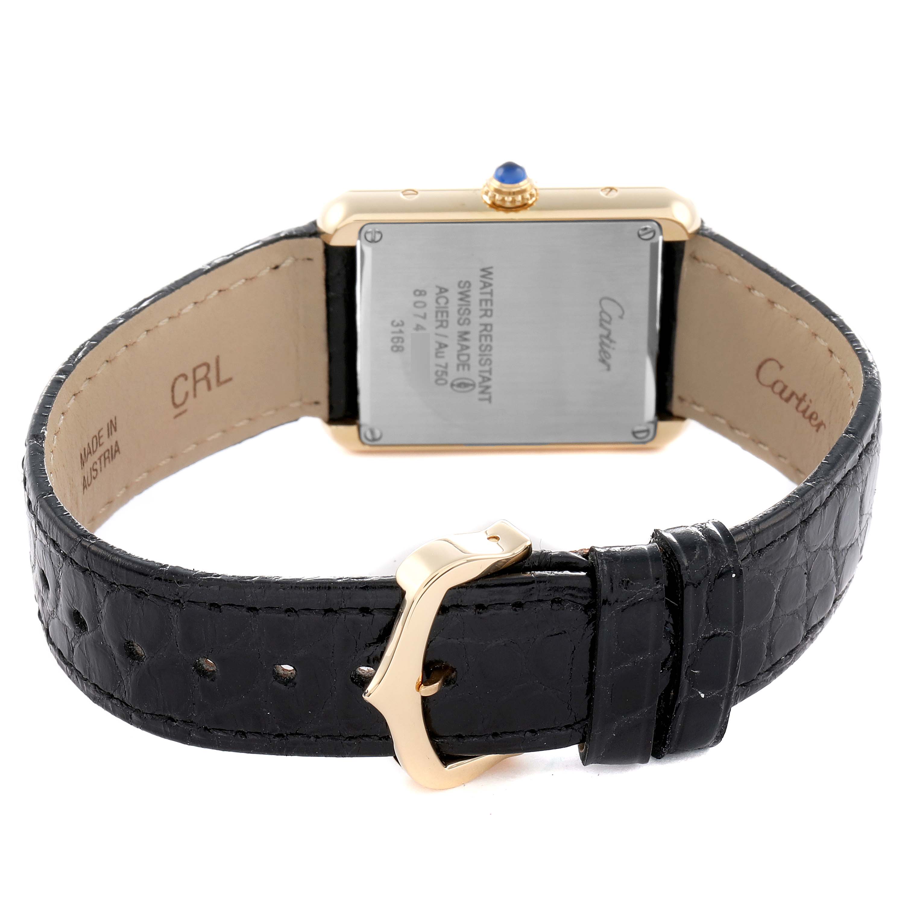 The Cartier Tank Solo W5200002 Women's Yellow Gold White Dial watch is shown from the back, displaying the caseback, crown, and leather strap with clasp.