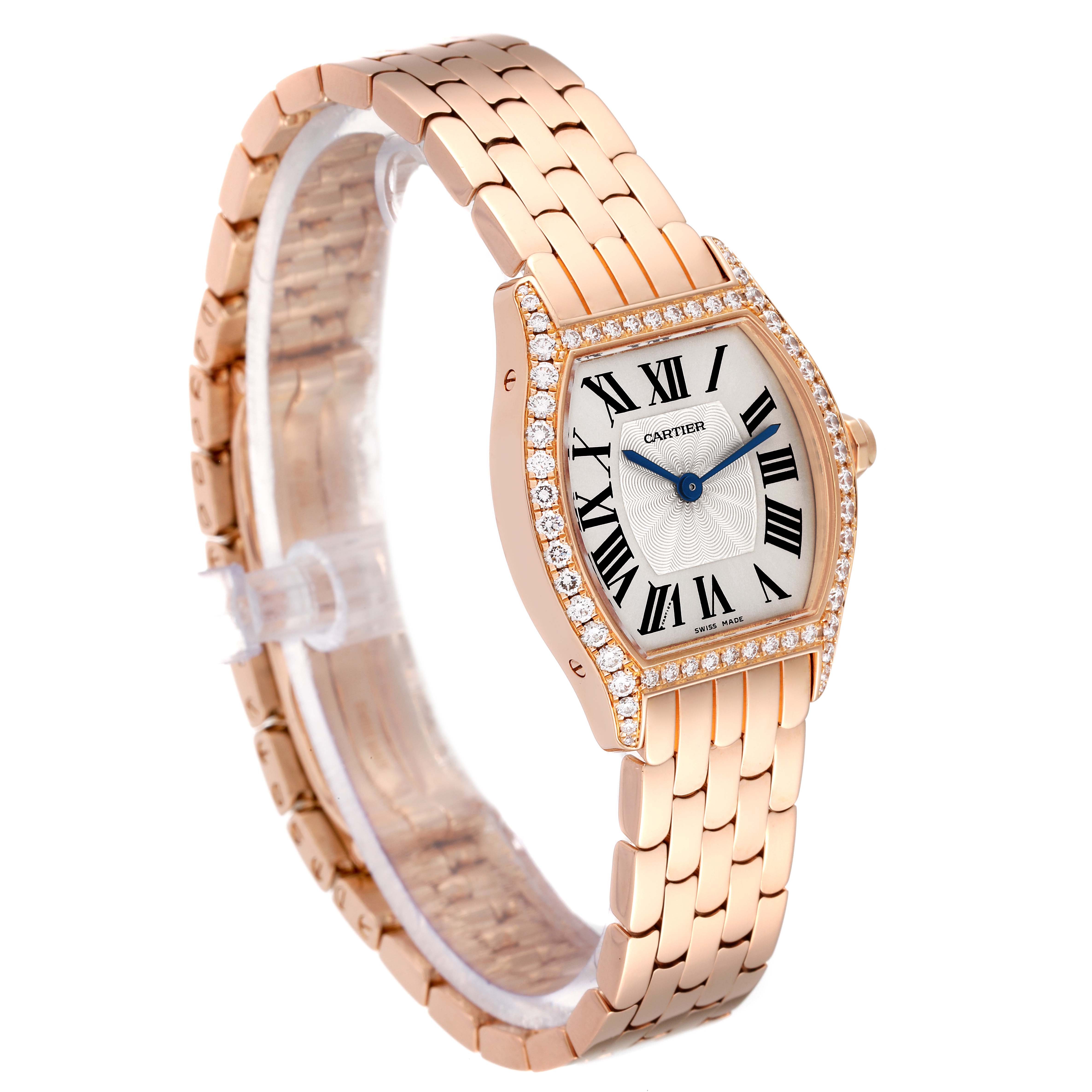 The Cartier Tortue WA501010 Women
s Rose Gold Silver Dial WA501010 Women
s Rose Gold Silver Dial watch is shown at a three-quarter angle highlighting the face, bracelet, and diamond bezel.