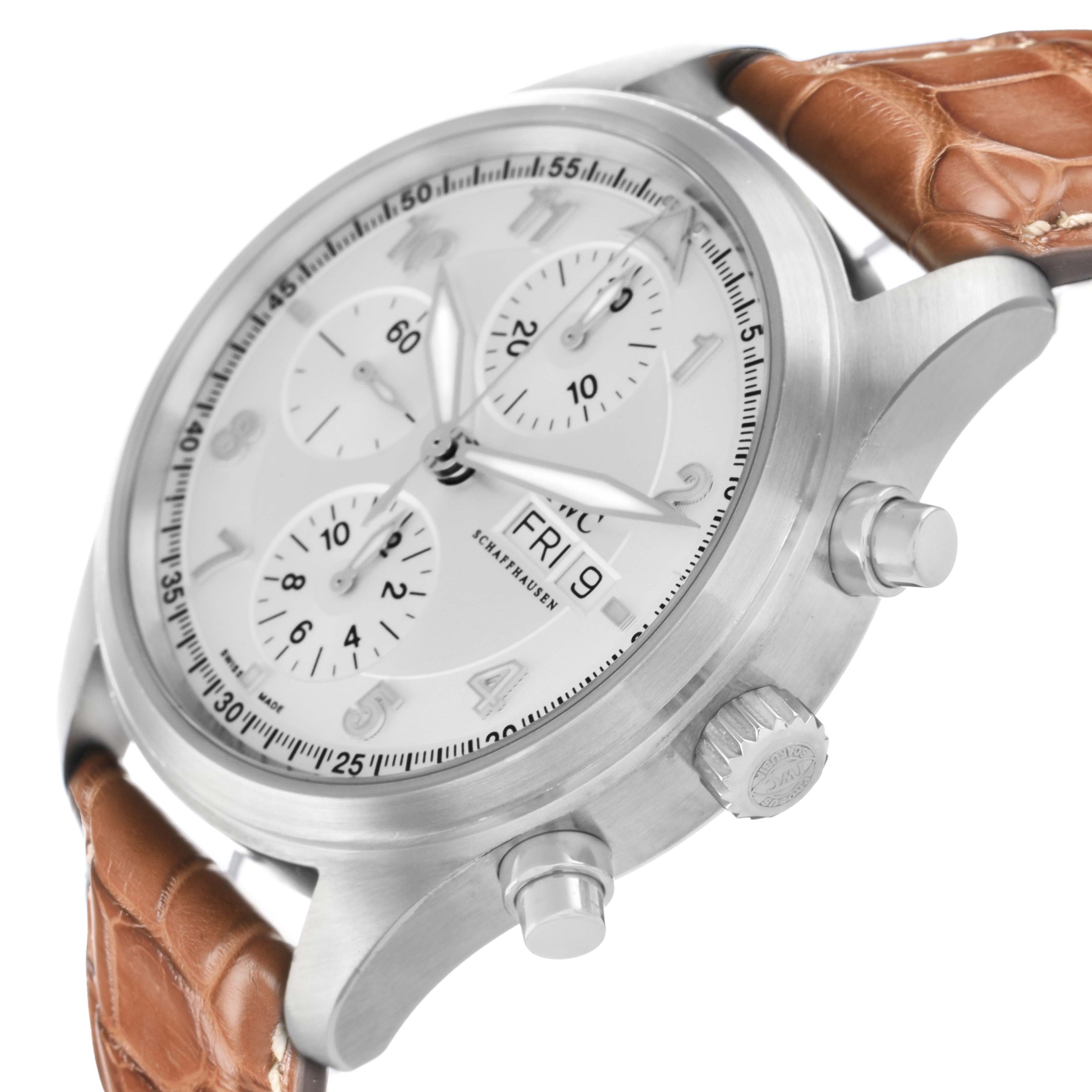 The IWC Pilot IW370623 Men
s Stainless Steel Silver Dial watch is shown at an angle displaying the side buttons, crown, and part of the leather strap.
