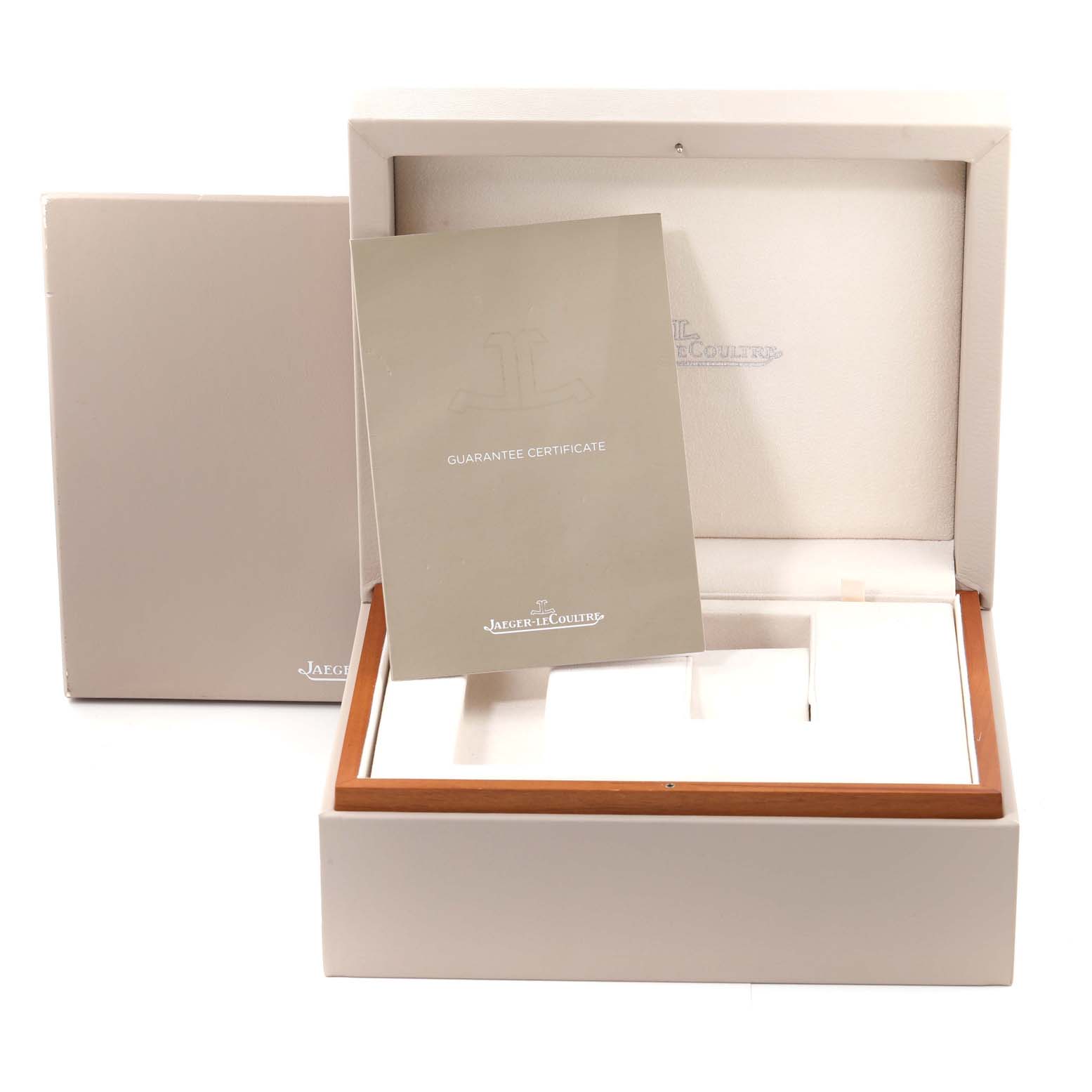 The image shows the open box, booklet, and guarantee certificate for the Jaeger LeCoultre Geophysic Q8108420 Men's Stainless Steel Blue Dial Q8108420 Men's Stainless Steel Blue Dial watch.