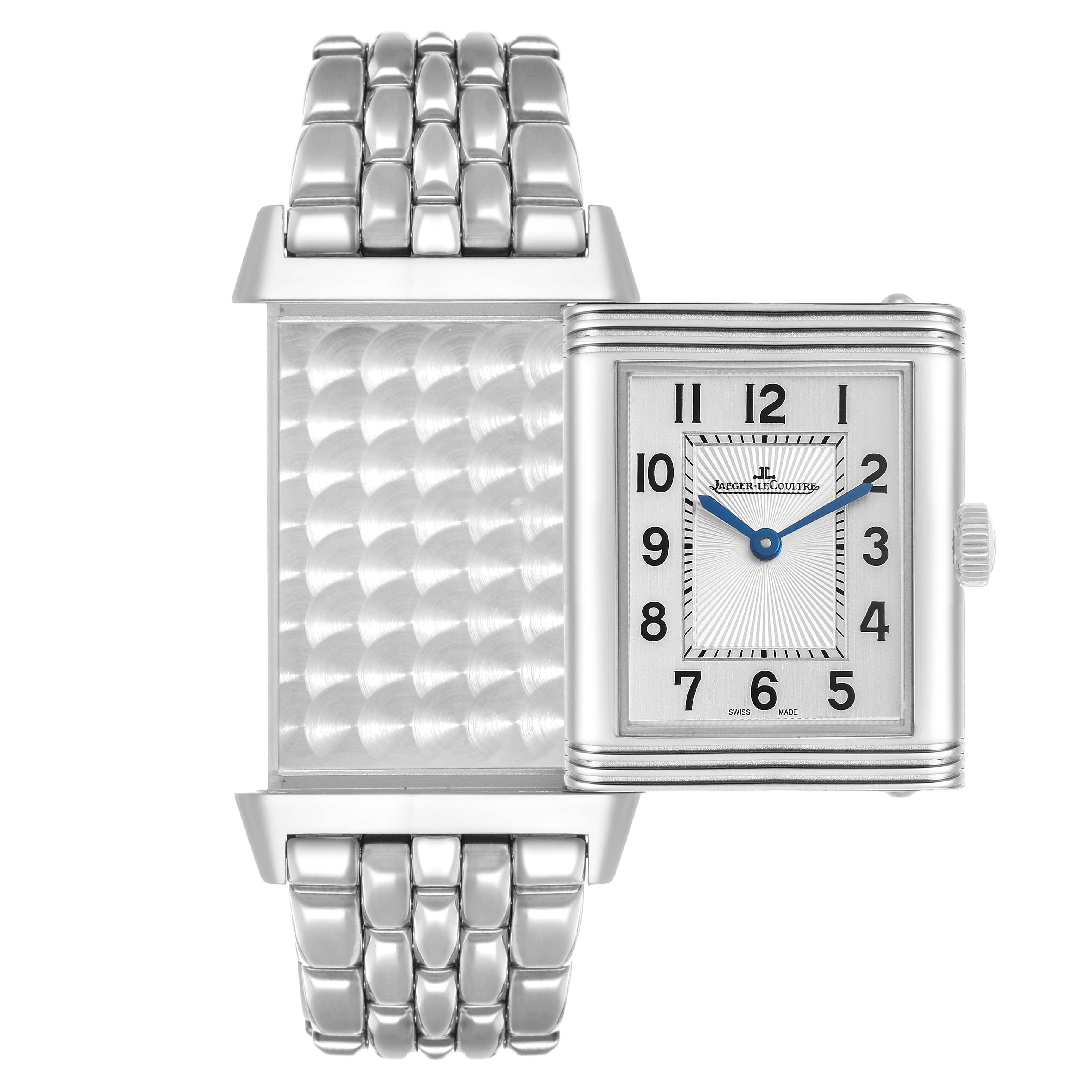 The Jaeger-LeCoultre Reverso watch is shown with its face flipped open, displaying both the dial and the guilloché back.