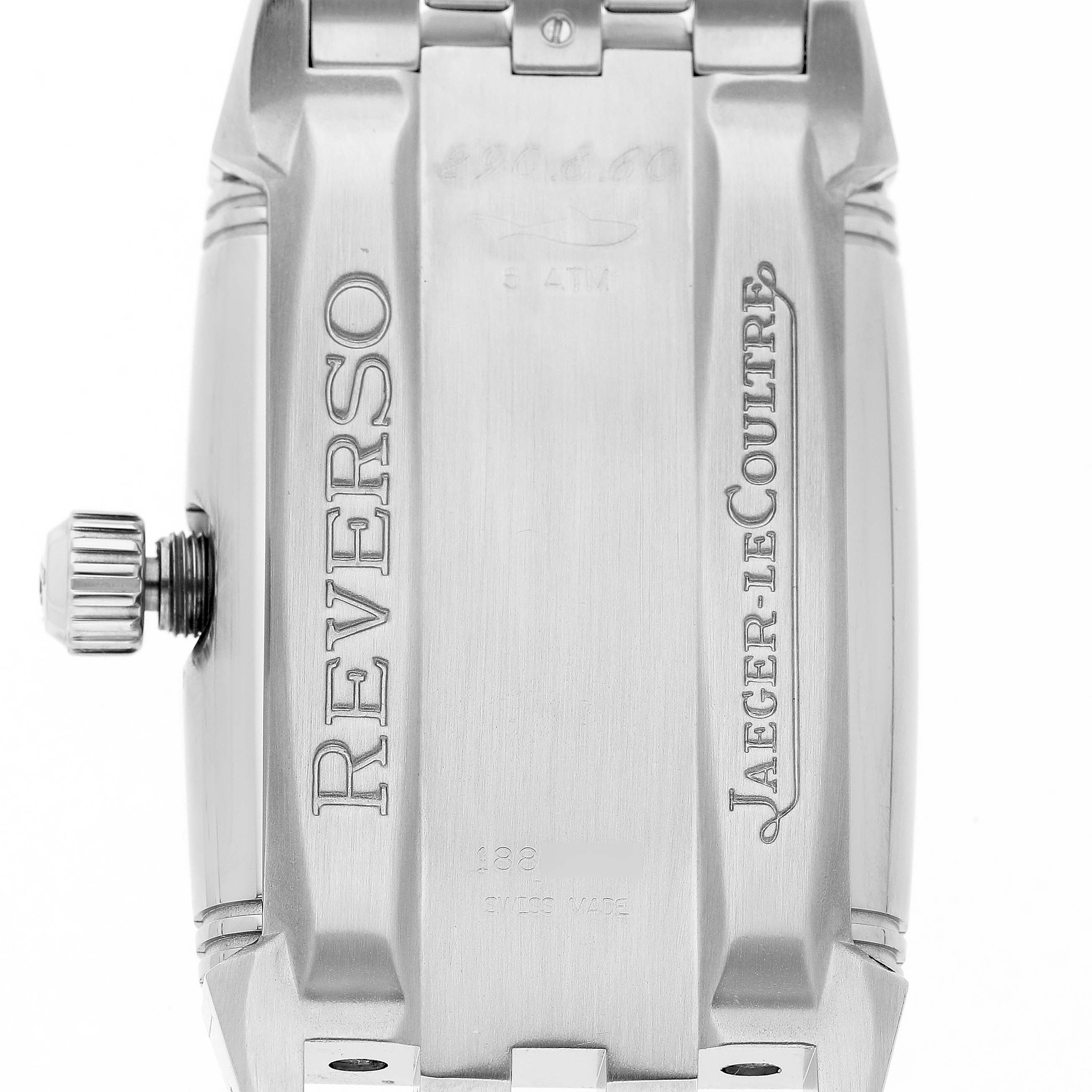The image shows the case back of a Jaeger LeCoultre Reverso Q2908101 Men's Stainless Steel Silver Dial watch, featuring the crown and engraved logos.