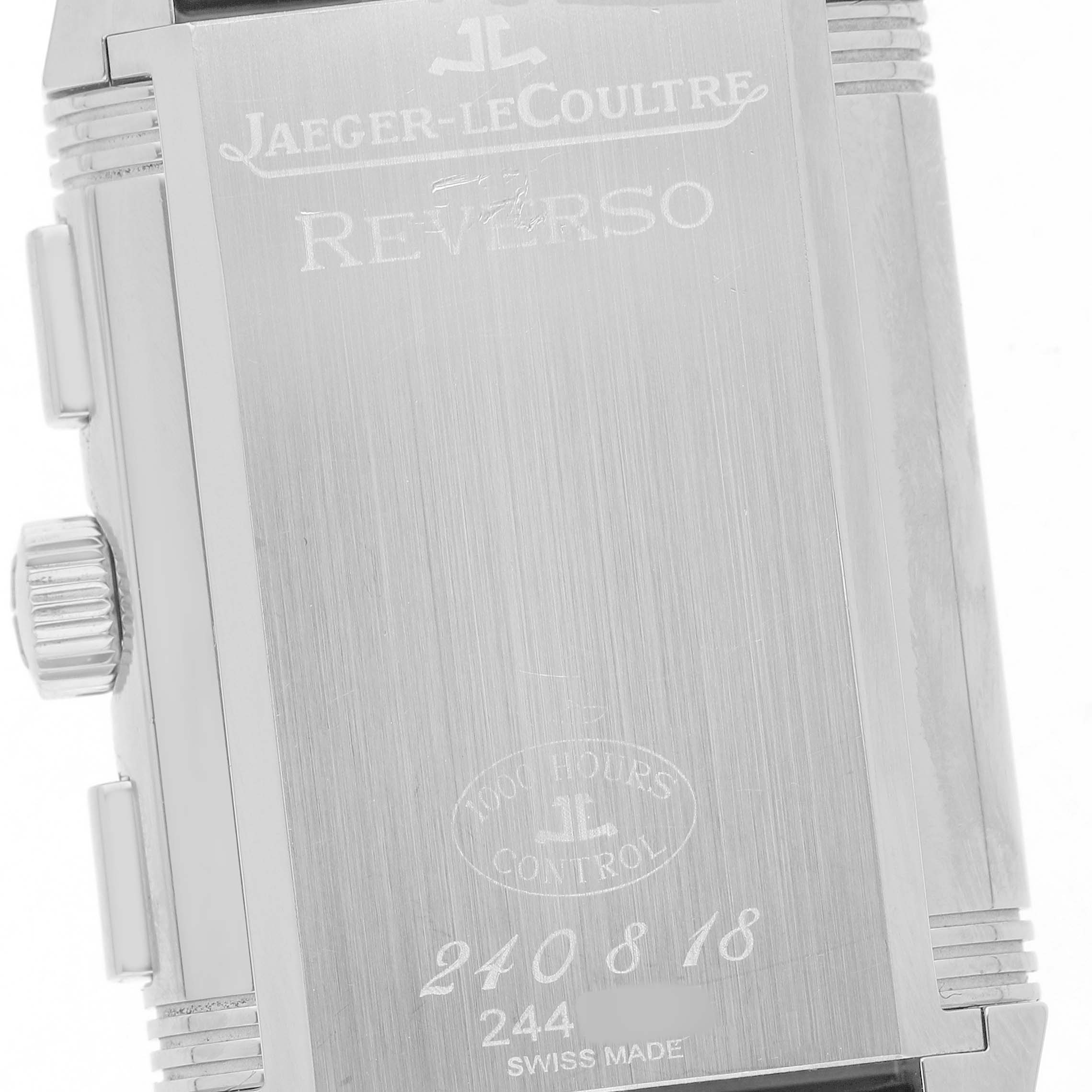 The image shows the side and back of a Jaeger-LeCoultre Reverso watch, highlighting the crown and engraved case back details.