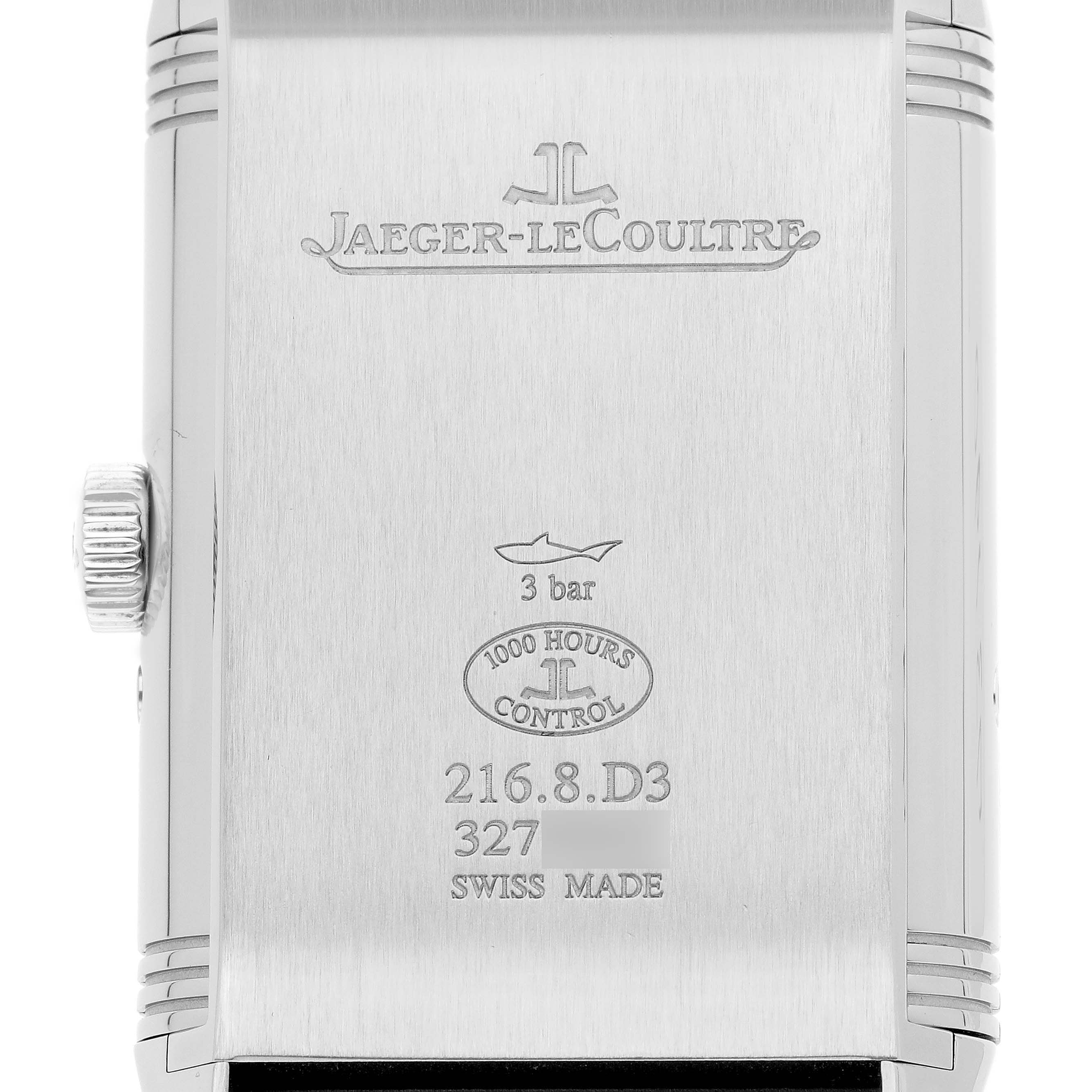 The image shows the back of a Jaeger-LeCoultre Reverso watch, displaying the logo, water resistance, and model details.