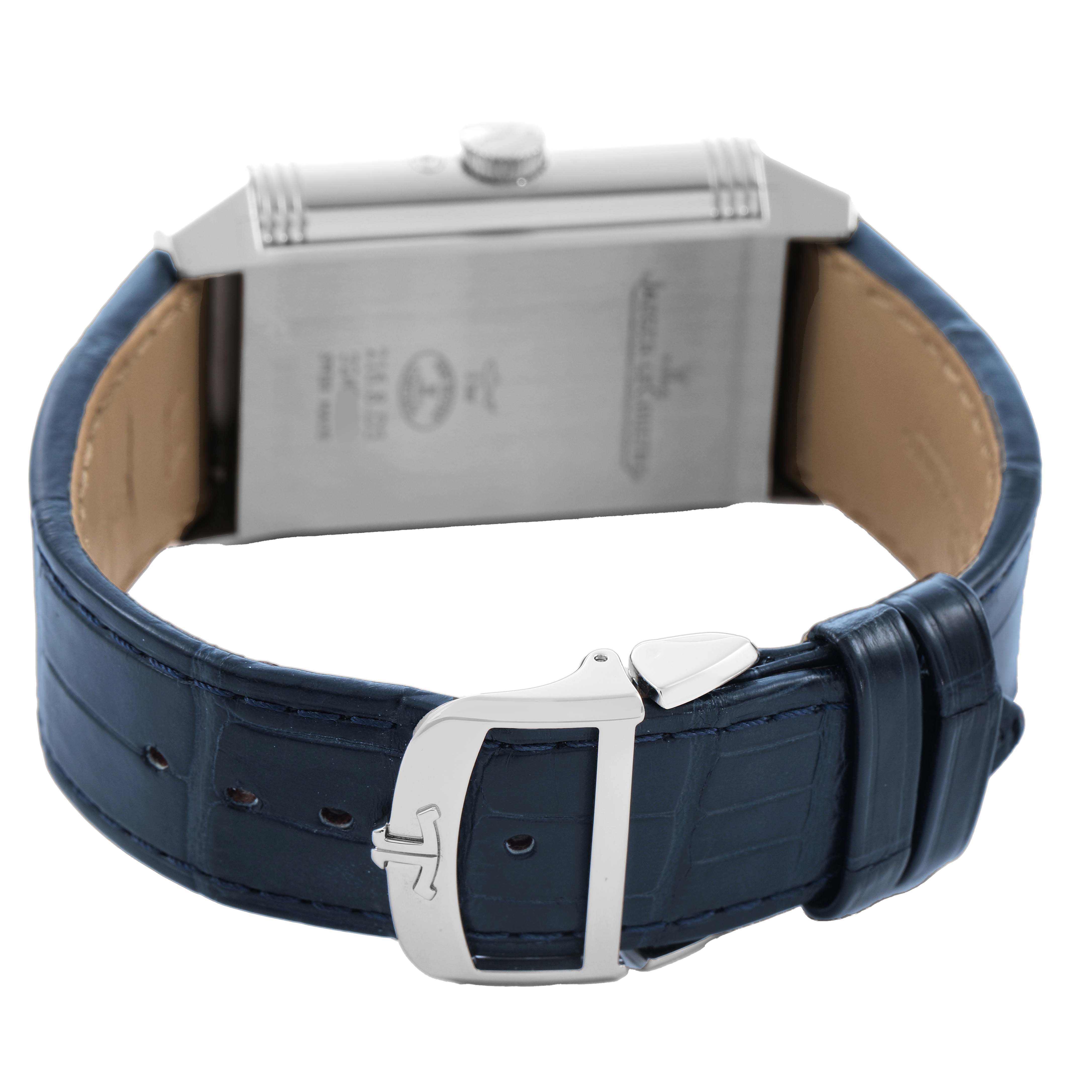 The Jaeger-LeCoultre Reverso watch is shown from the back, displaying its case, strap, and clasp.
