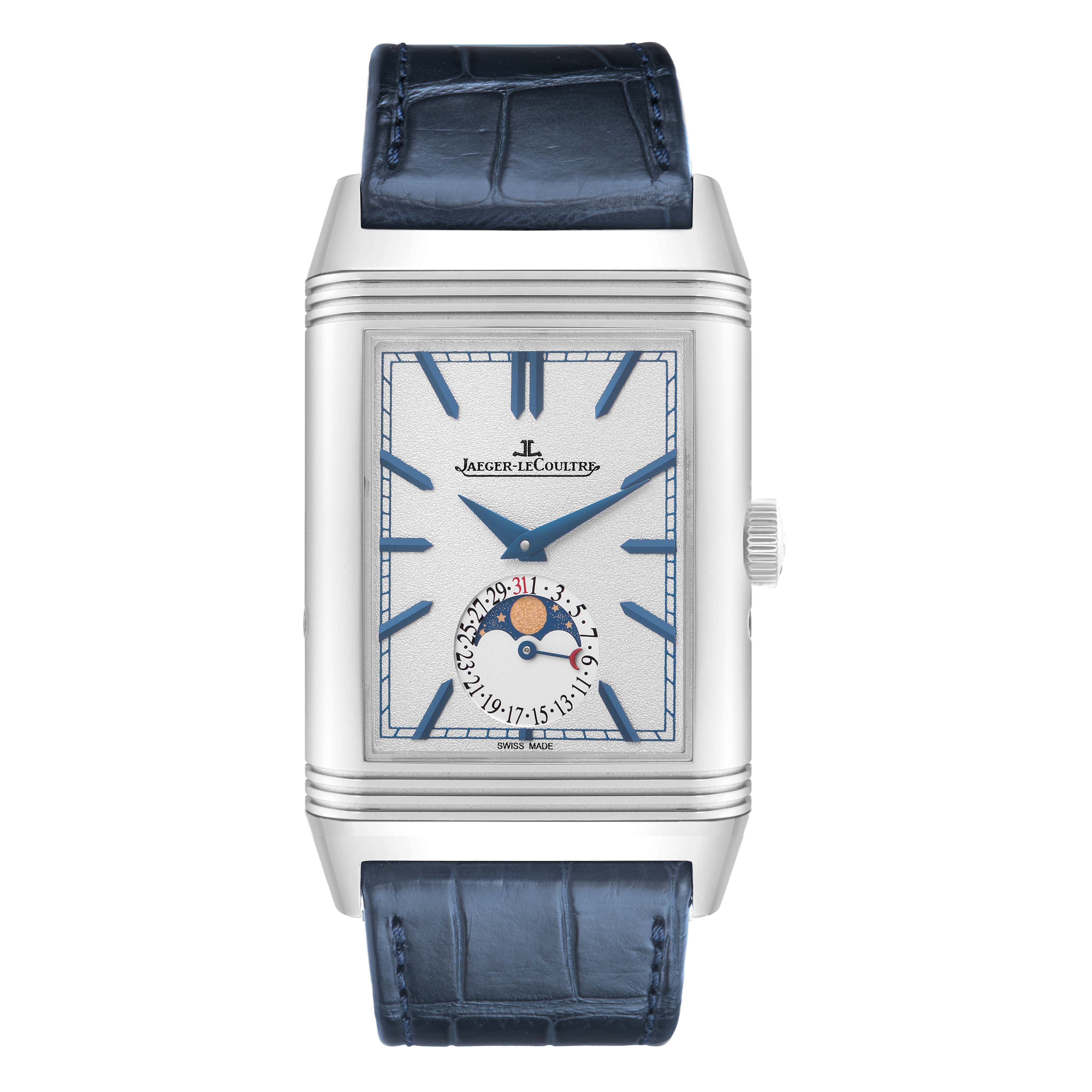 The Jaeger-LeCoultre Reverso watch is shown from the front, featuring its rectangular face, blue markers, moon phase, and blue leather strap.