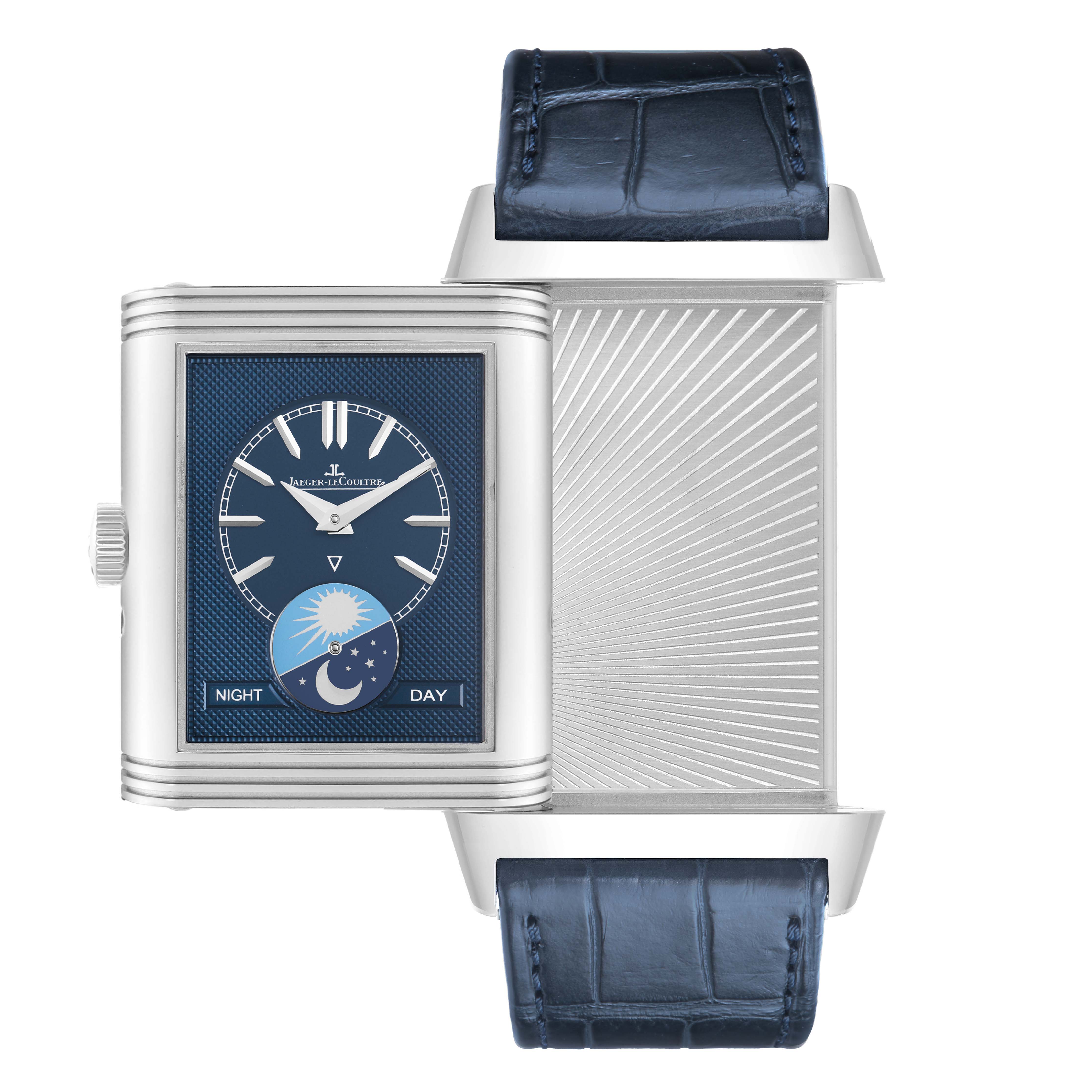 The Jaeger-LeCoultre Reverso watch is shown from a top view, with the face and reverse side visible, featuring a blue strap.