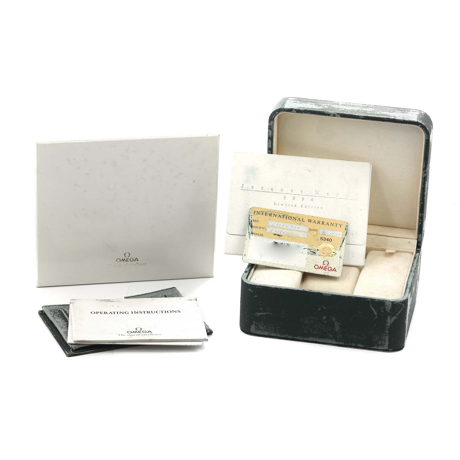 The image shows Omega Seamaster 2553.41.00 Men
s Stainless Steel Green Dial accessories, including a box, warranty card, and instruction manuals, from a front angle.