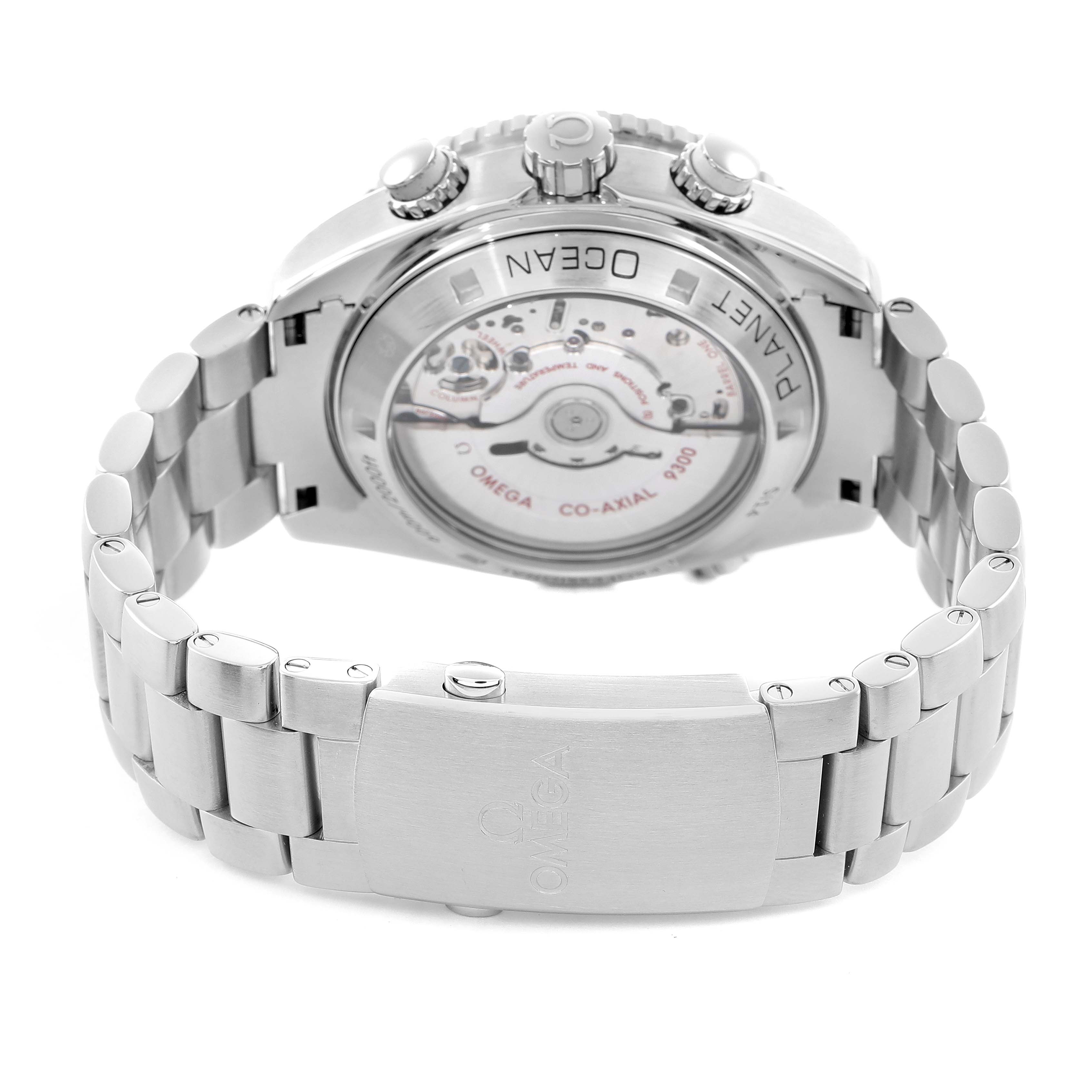 The Omega Seamaster 232.30.46.51.01.002 Men
s Stainless Steel Black Dial watch is shown from the back, highlighting the movement and bracelet clasp.