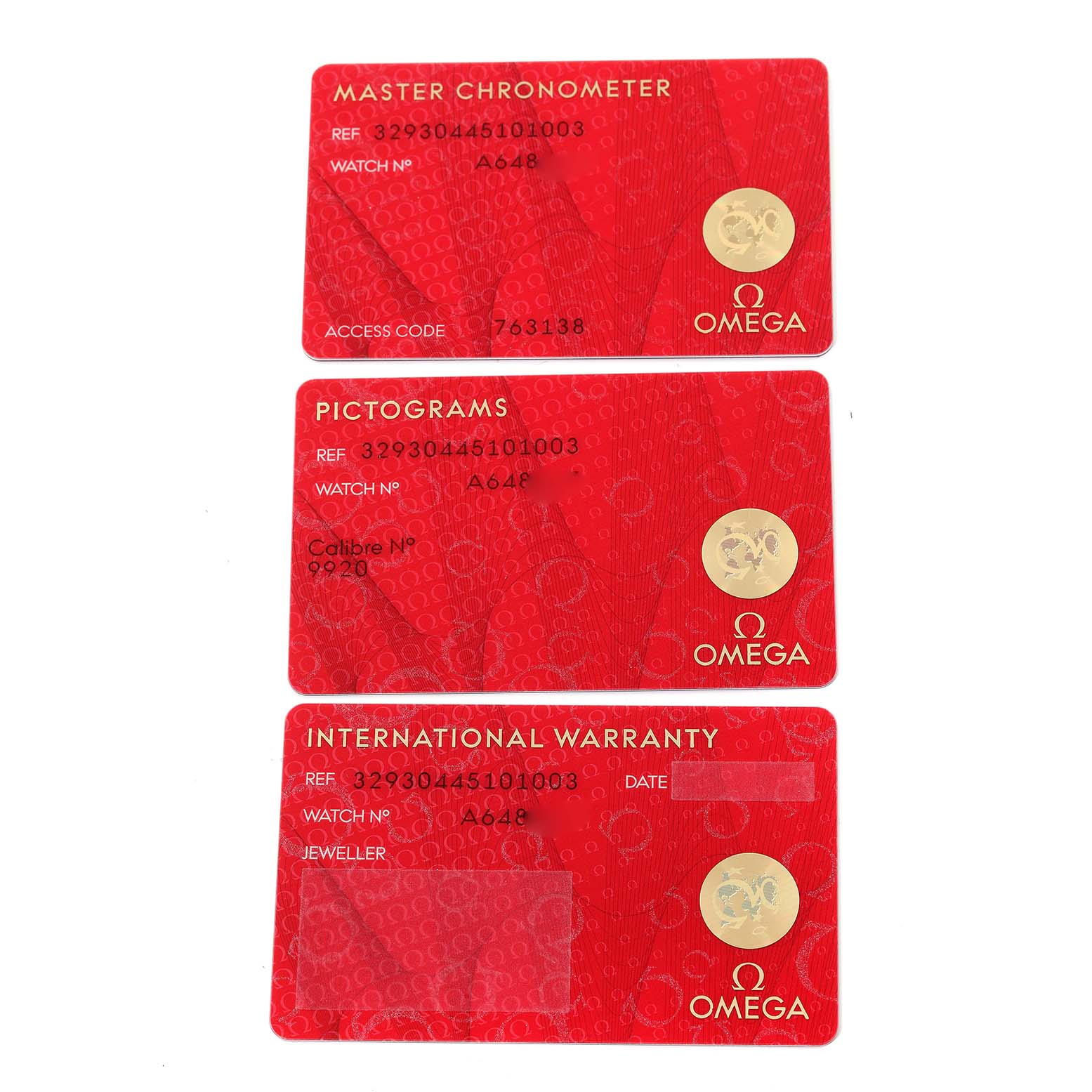 The image shows three certification and warranty cards for the Omega Speedmaster 329.30.44.51.01.003 Men
s Stainless Steel Black Dial 329.30.44.51.01.003 Men
s Stainless Steel Black Dial watch model.