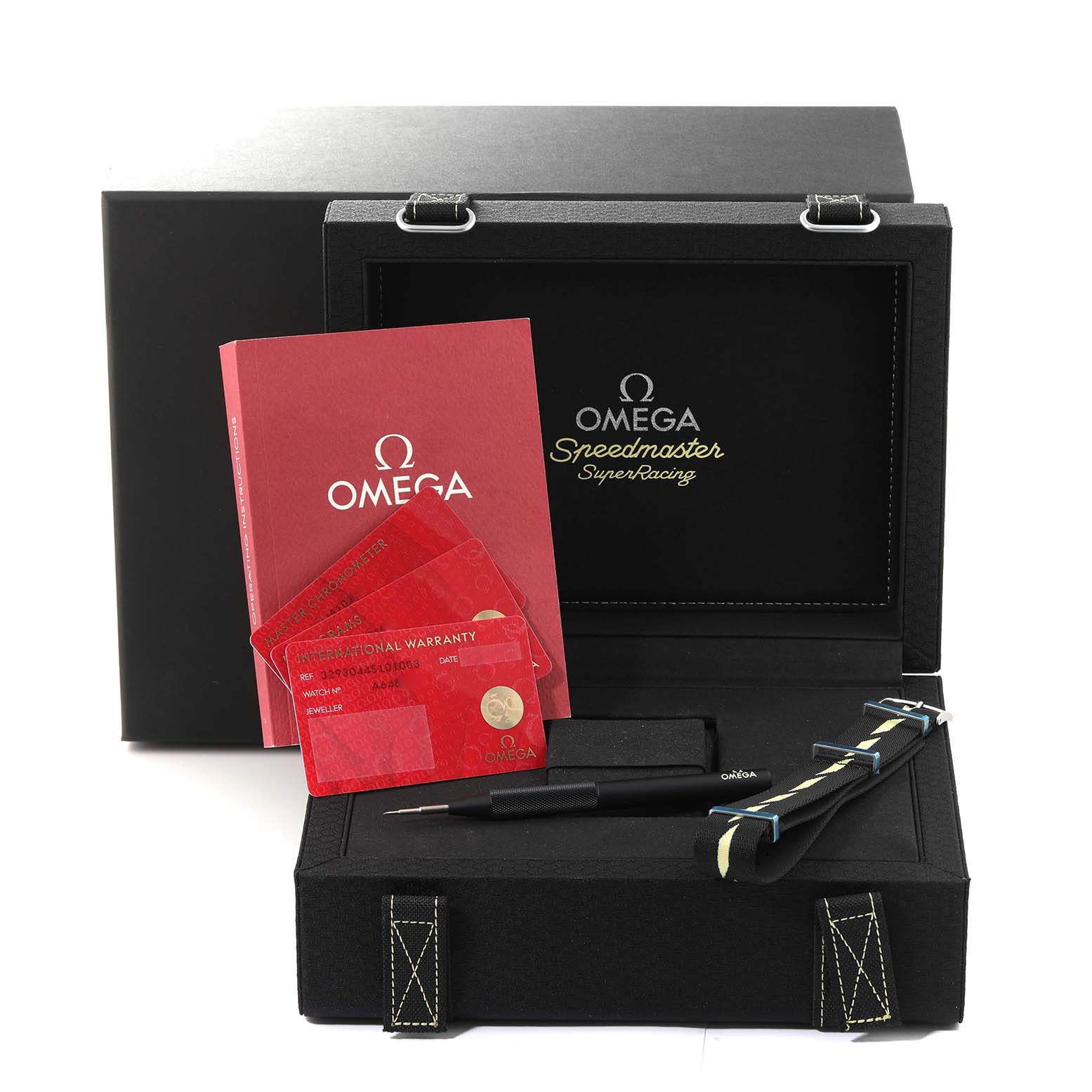 The image shows an Omega Speedmaster 329.30.44.51.01.003 Men
s Stainless Steel Black Dial 329.30.44.51.01.003 Men
s Stainless Steel Black Dial watch box with a warranty card, manual, pen, and additional strap.