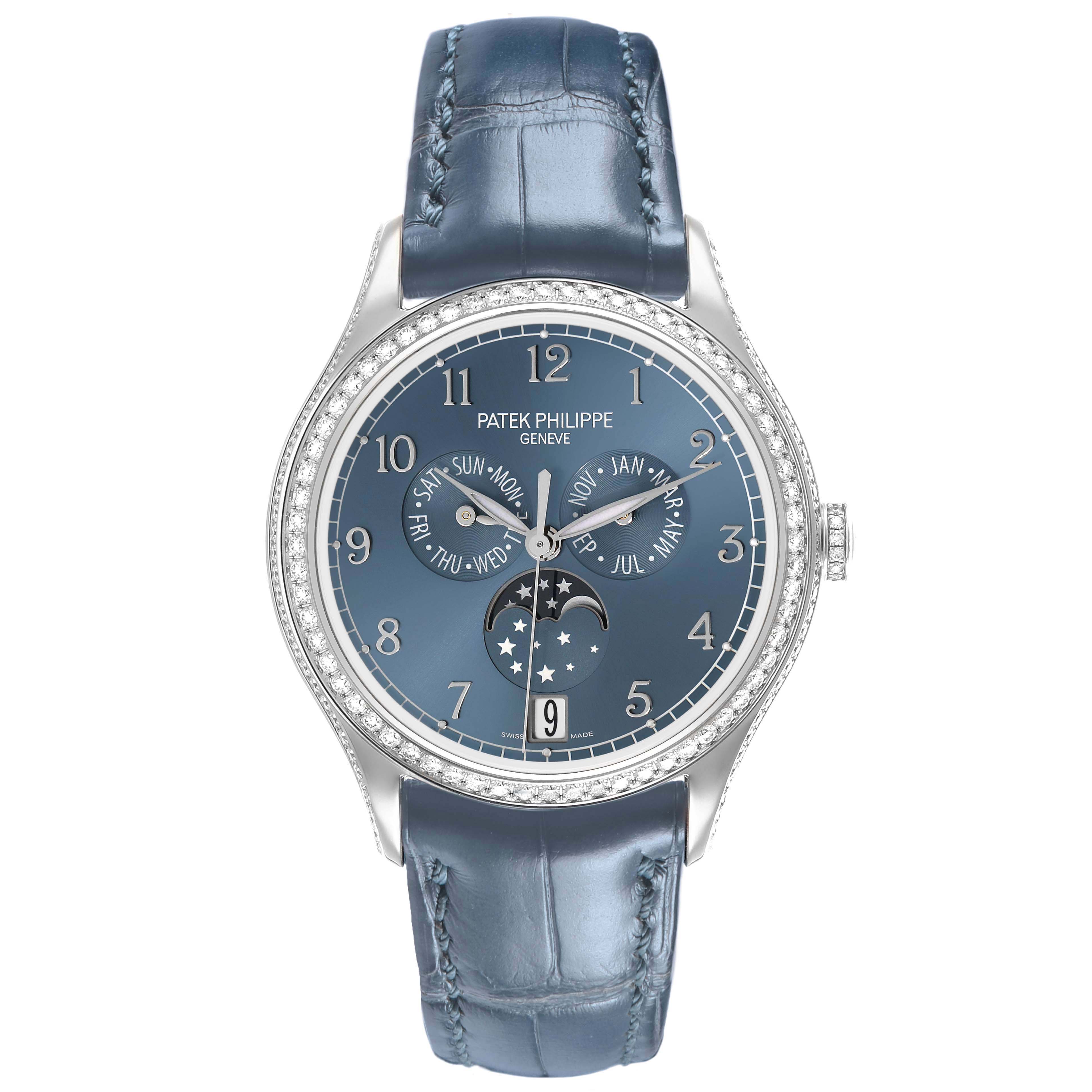 The Patek Philippe Complications 4947G-001 Mens White Gold Blue Dial watch is shown from the front, highlighting the dial, bezel, and blue strap.
