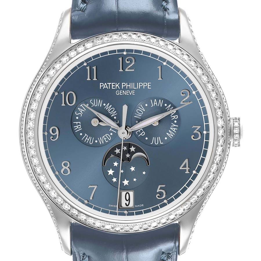 The Patek Philippe Complications 4947G-001 Mens White Gold Blue Dial watch is shown from the front, highlighting its blue dial, subdials, moon phase, and diamond bezel.